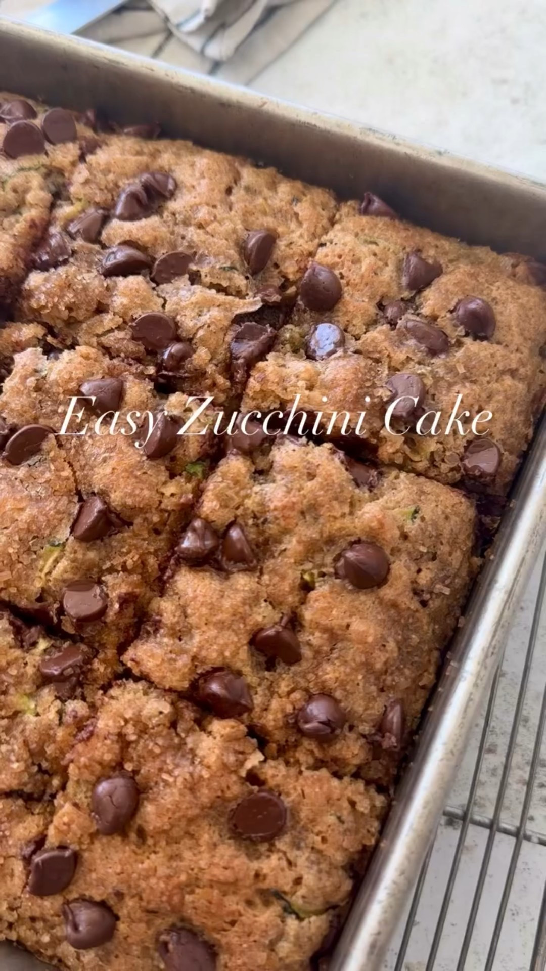 A simple Zucchini Cake that’s moist, lightly spiced, and studded with chocolate chips. Made with everyday ingredients and no frosting needed, it’s perfect for using up summer zucchini and enjoying any time of day. Full recipe here: https://www.twopeasandtheirpod.com/easy-zucchini-cake/

#LTKSeasonal #LTKHome #LTKFindsUnder50