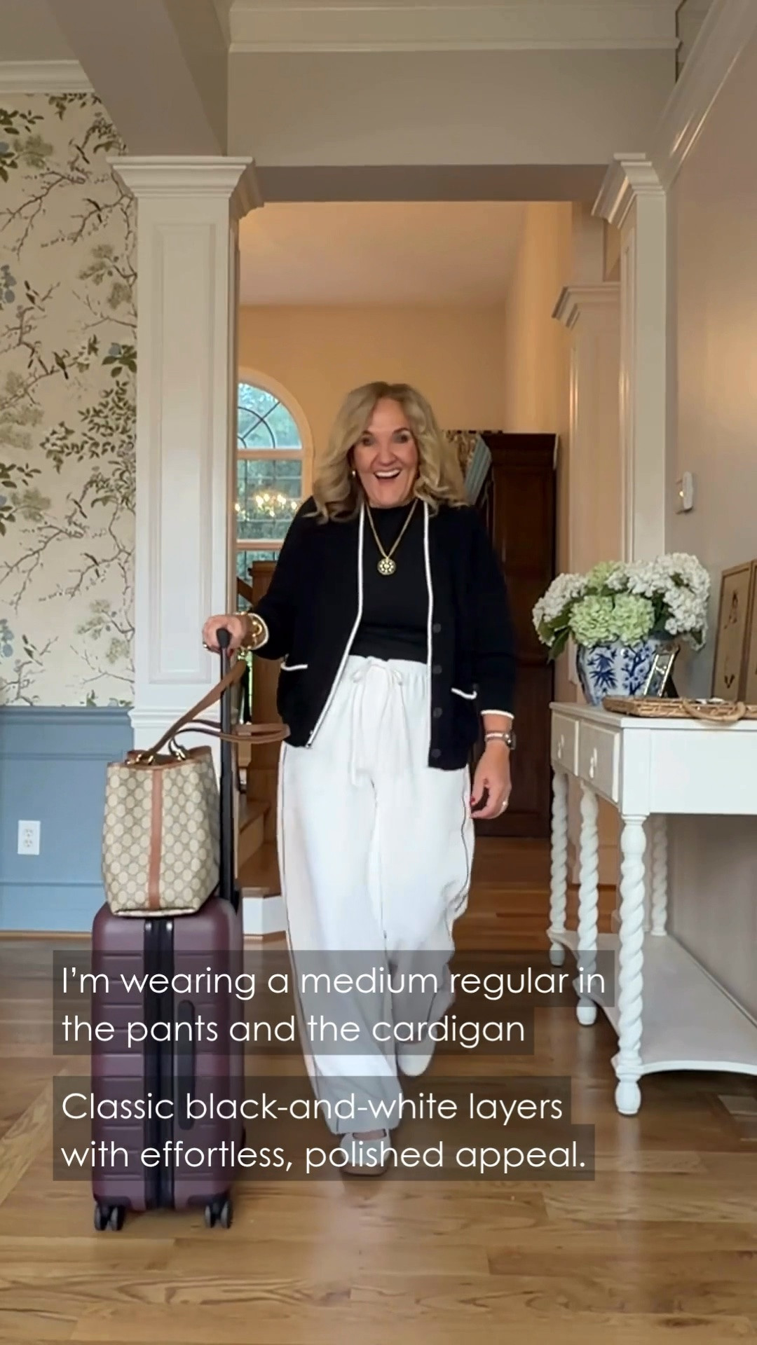 This black cardigan and white wide-leg pants are a comfortable, polished travel-day combination. Easy layers and supportive flats make this a look I’d happily wear from the airport to dinner.

💡 LTK MADE EASY
❤️ Heart = Support my posts!
🔖 Save = Get sale & restock alerts
📋 Lists = Keep favorites organized
📲 Share = Send lists and products to a friend. Hello, Christmas List!
💬 Comment = Ask me anything about what I'm wearing.:-)

#LTKootd #LTKTravel #LTKOver40