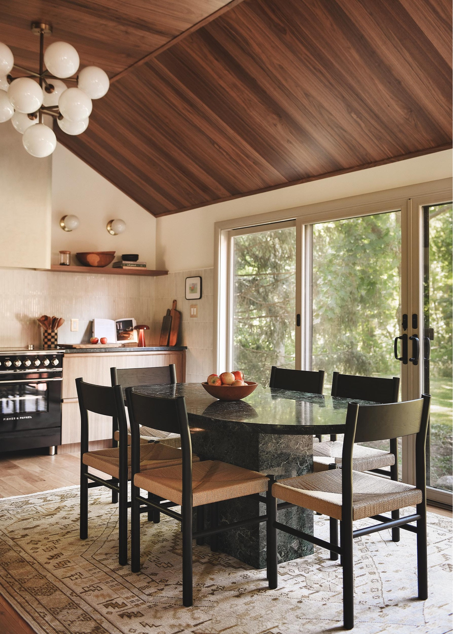 In the Michigan Red House kitchen, another more traditional vintage inspired rug again plays the role of neutral under the bold green marble vintage dining table. Here are a few similar.

#LTKHome