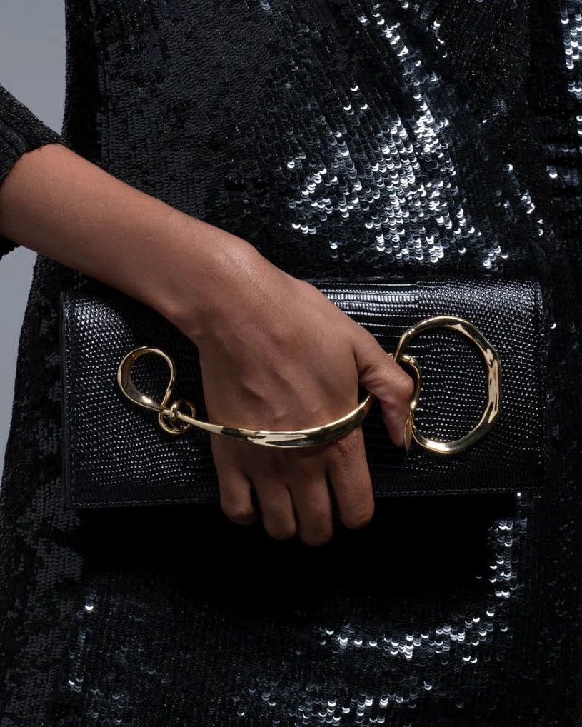 Twisted Gold Black Leather Clutch – ALEXIS BITTAR | Alexis Bittar