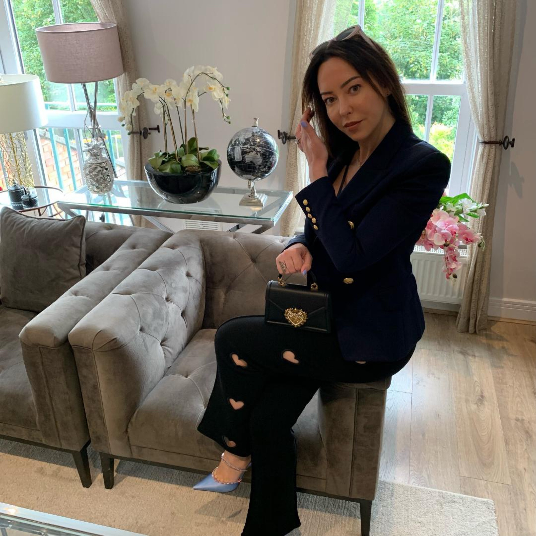 Navy blazer, heart cut out trousers, point toe blue heels, black mini handbag, white sunglasses, sunnies 

#LTKstyletip #LTKeurope #LTKSeasonal