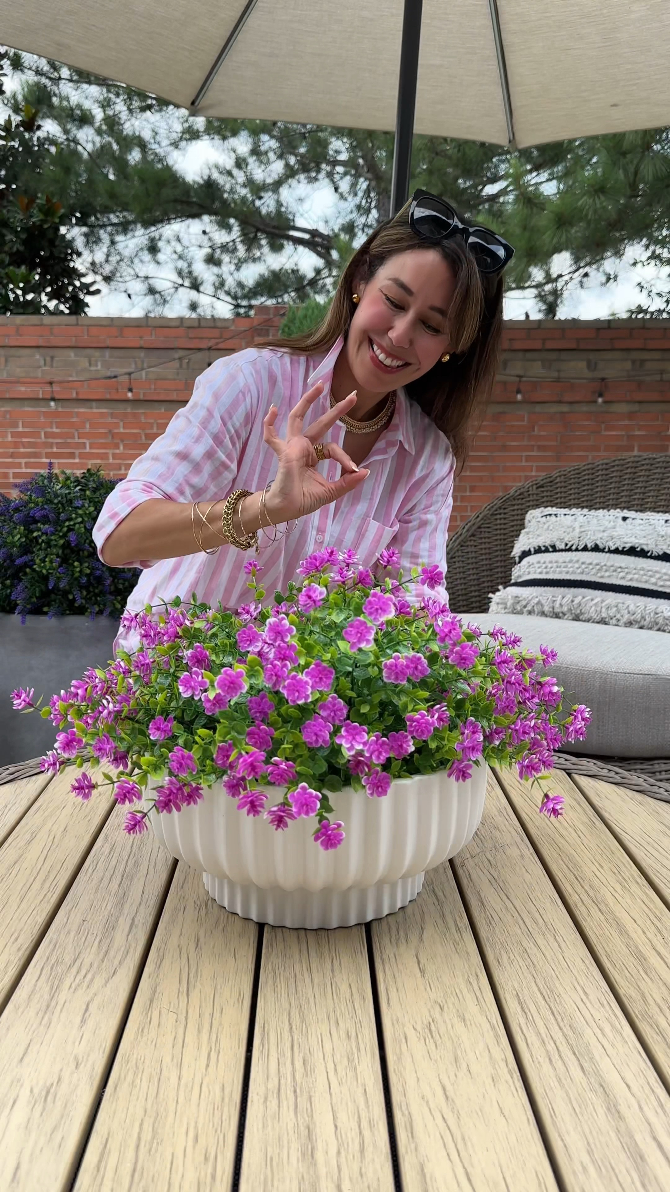 Seriously the prettiest outdoor arrangement for under $45!! I used my Walmart fluted planter and a pack of these gorgeous faux outdoor flowers. 

👉👉They come in a pack of 12 and that’s what I used in the bowl. They are also UV resistant. 

#LTKVideo #LTKHome #LTKSeasonal