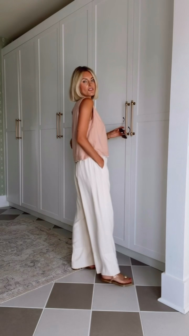 This pink top is so cute! I love the scalloped edge on the bottom! I just paired it with some linen pants. Such a cute look for summer! Wearing S! Loverly Grey, Amazon, summer outfit, vacation looks

#LTKootd #LTKSeasonal #LTKTravel
