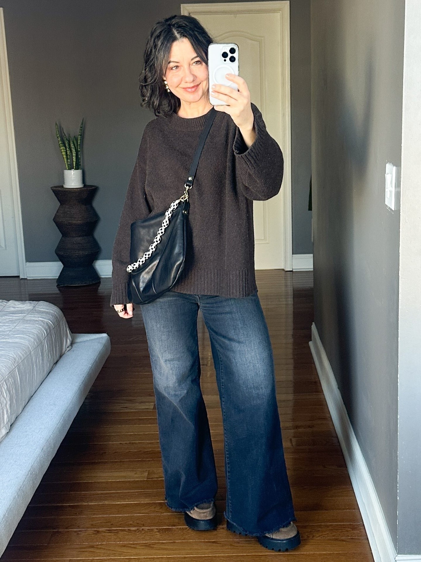 Finishing up my "Most-Worn Pieces In My Winter Closet Round-Up" and realize I'm wearing four of them in this one selfie. A big oversized sweater, stretchy wide-legs, a Clare V Moyen Messenger, and my go-to everyday brown boots.