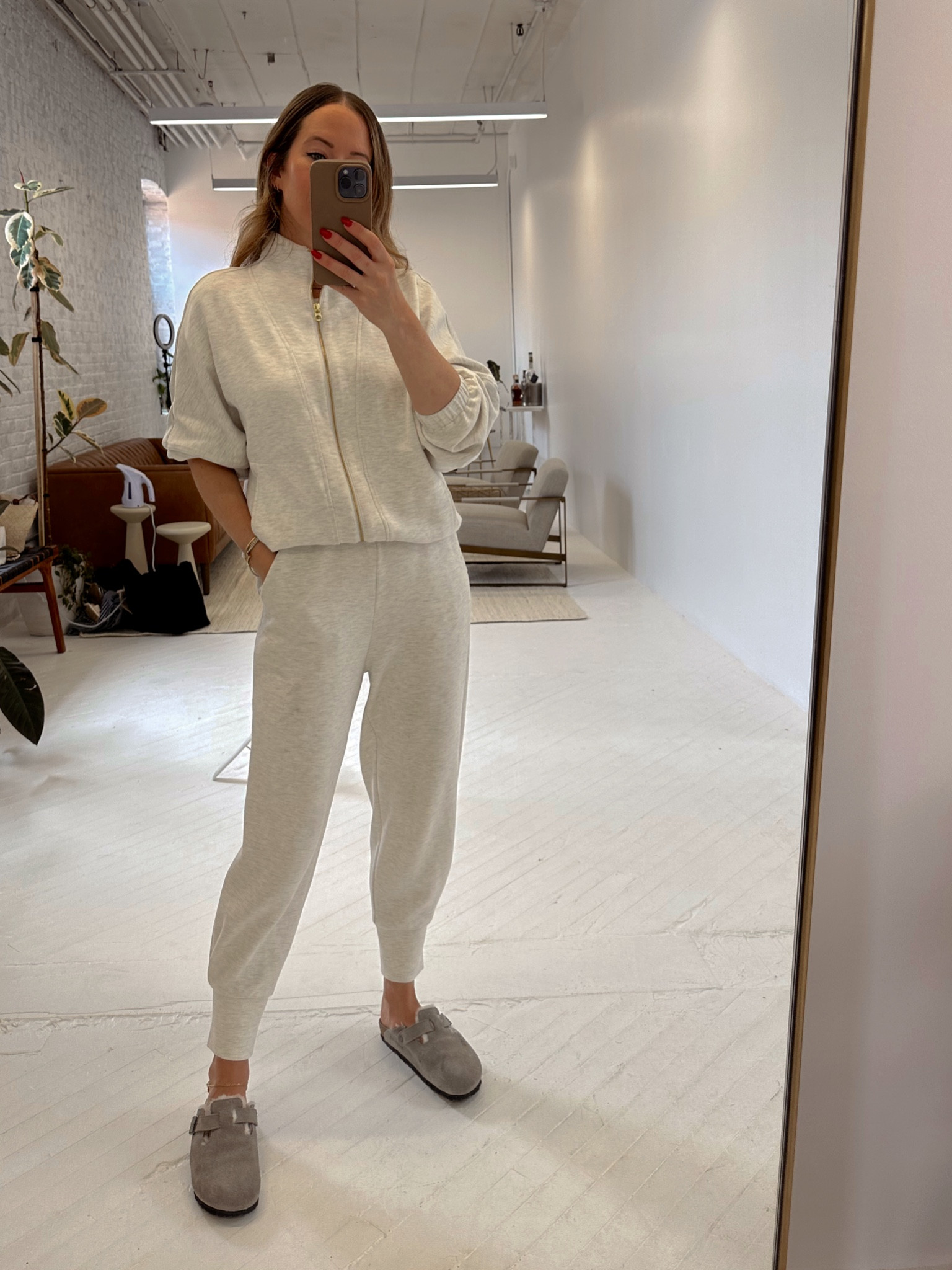 Wearing both zip up and pants in a small. 