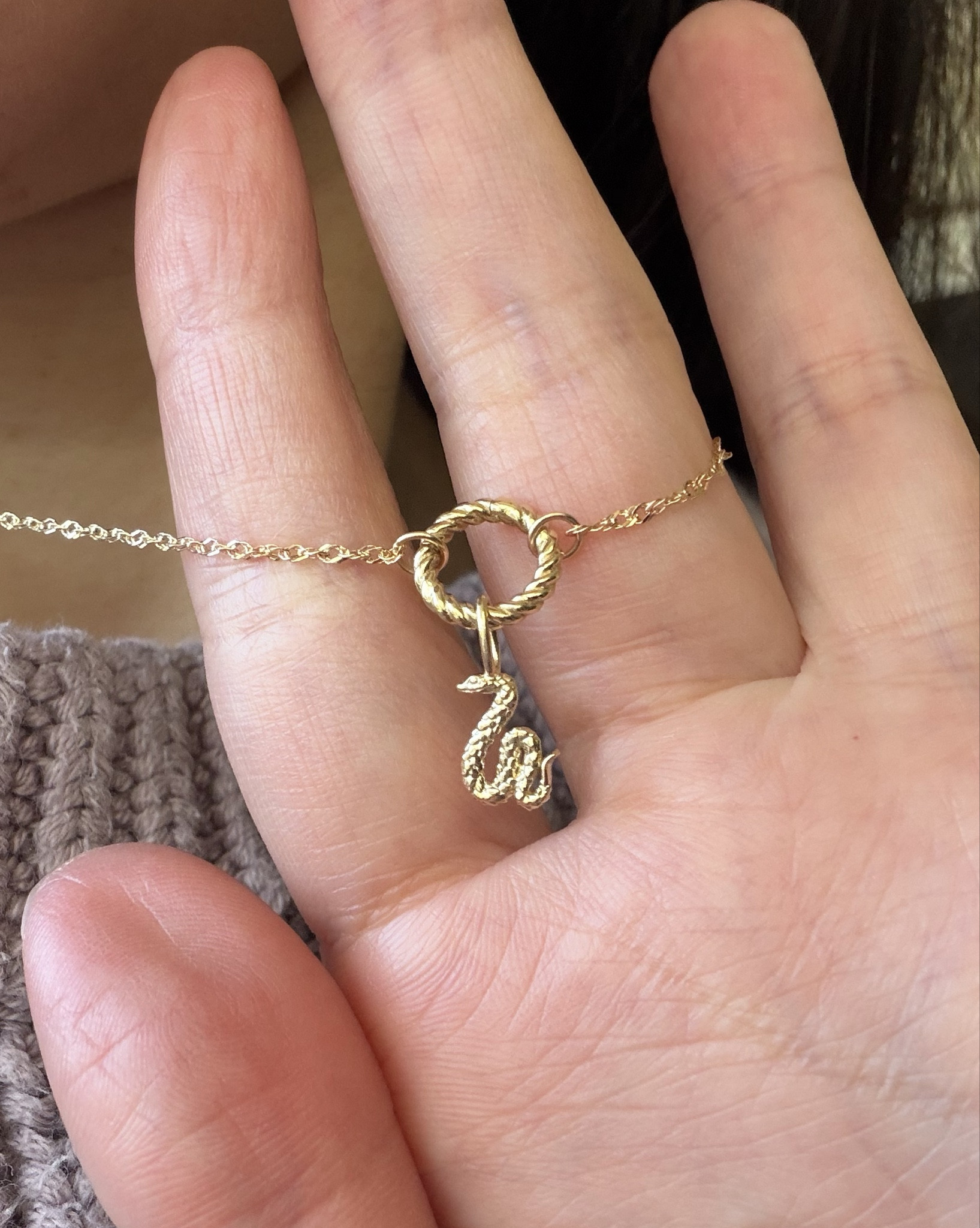 Catbird NYC 14k solid gold lunar new year zodiac charm on twisted gold charm holder ring and 16” sweet nothing gold chain. Such a good Valentine’s gift! 16 inch gold chain sits perfectly at the collar bone over this Quince cotton sweater but for turtlenecks or thicker sweaters I also use my 19 inch petite second avenue chain (not pictured here).

#LTKValentine #LTKmomlife #LTKPetite