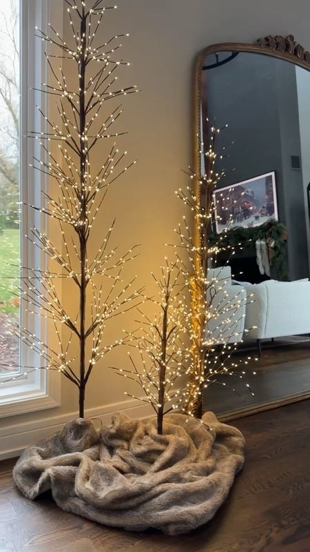 The infamous holiday twig pre-lit trees! These Pottery Barn ones are truly so stunning, and I love how cozy they make a room when the lights are off at night and we watch a show. Linking similar options too! Always a top seller!

#LTKhome #LTKHoliday #LTKstyletip
