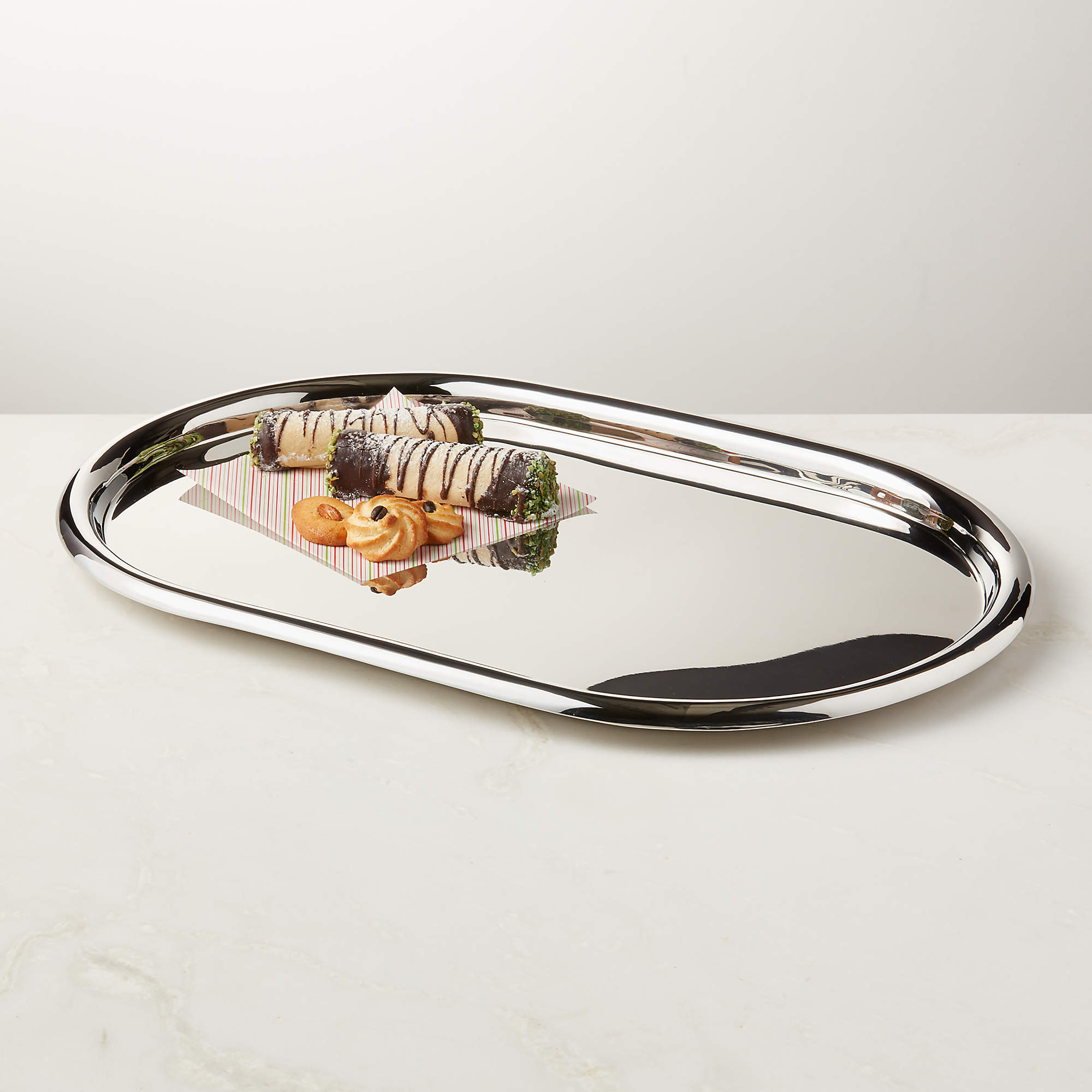 Piero Oval Polished Stainless Steel Serving Tray by Gianfranco Frattini + Reviews | CB2 | CB2