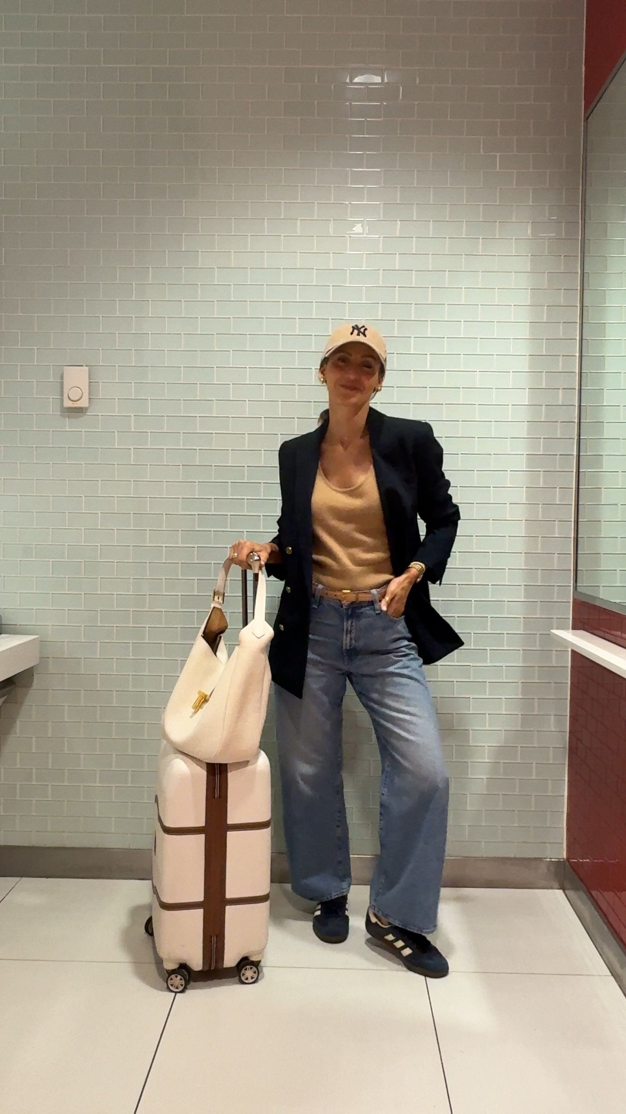 Airport outfit loading….
Most comfy pair of jeans size 26, fits very oversized and cropped ankle style
Navy Adidas samba size down a size and a half (these are men’s) 
Cashmere tank XS 
Navy blazer almost sold out, added a similar 

#LTKStyleTip #LTKTravel #LTKVideo