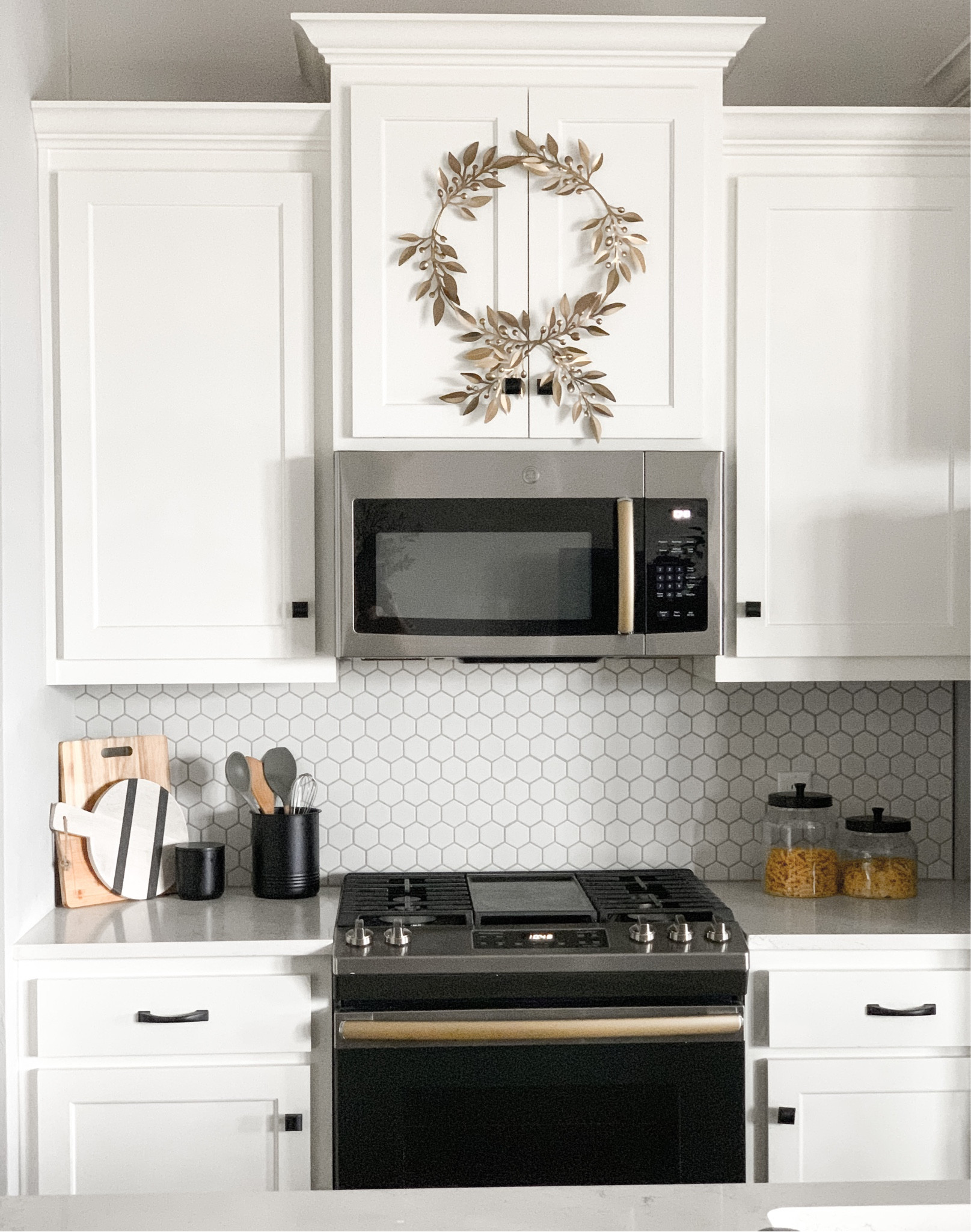 Simple Christmas/Winter Kitchen Styling. Wreath is actually a table garland that I wrapped around a wreath ring and secured with small metal wires.

Home decor, winter decor, winter wreath, winter garland, table garland, gold decor

#LTKstyletip #LTKHoliday #LTKhome