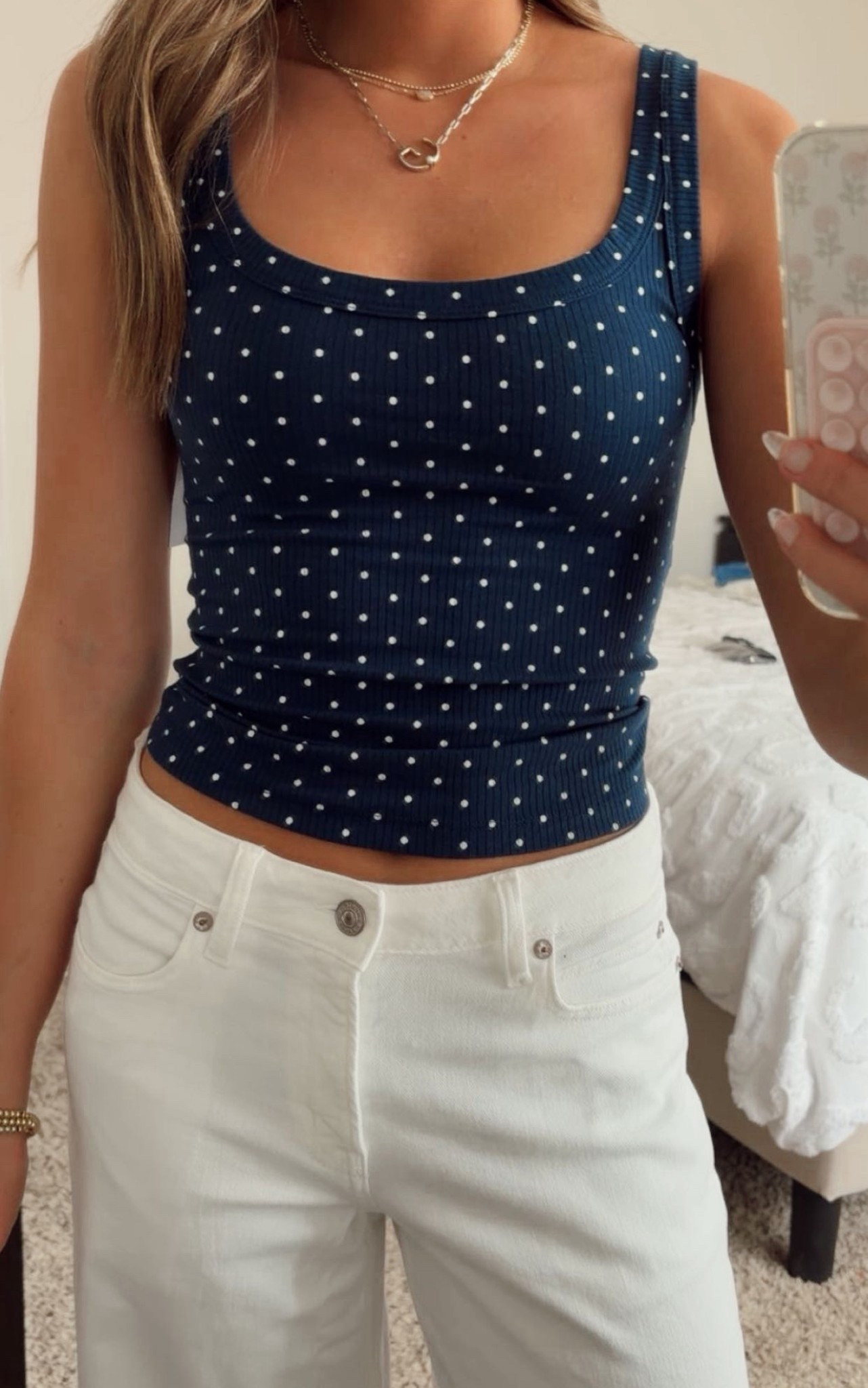spring outfit inspo!! cute for dinner on a warm night or running errands on a sunny day. Loving american eagle lately and I have been searching for white jeans forever. These low-rise wide leg white jeans are the perfect fit, I am wearing a 00. And this navy & white polka dot top is the cutest, so simple but adds to the outfit. And my staple necklaces of course from Kendra Scott. With cute slip on shoes or sandals, this outfit is perfect for a lot, check it out below!!

#LTKOOTD #springoutfitinspo #springwear #americaneagle #whitejeans #LTKAE #AEspring #ootd 

 #LTKdayinmylife #LTKootd #LTKU