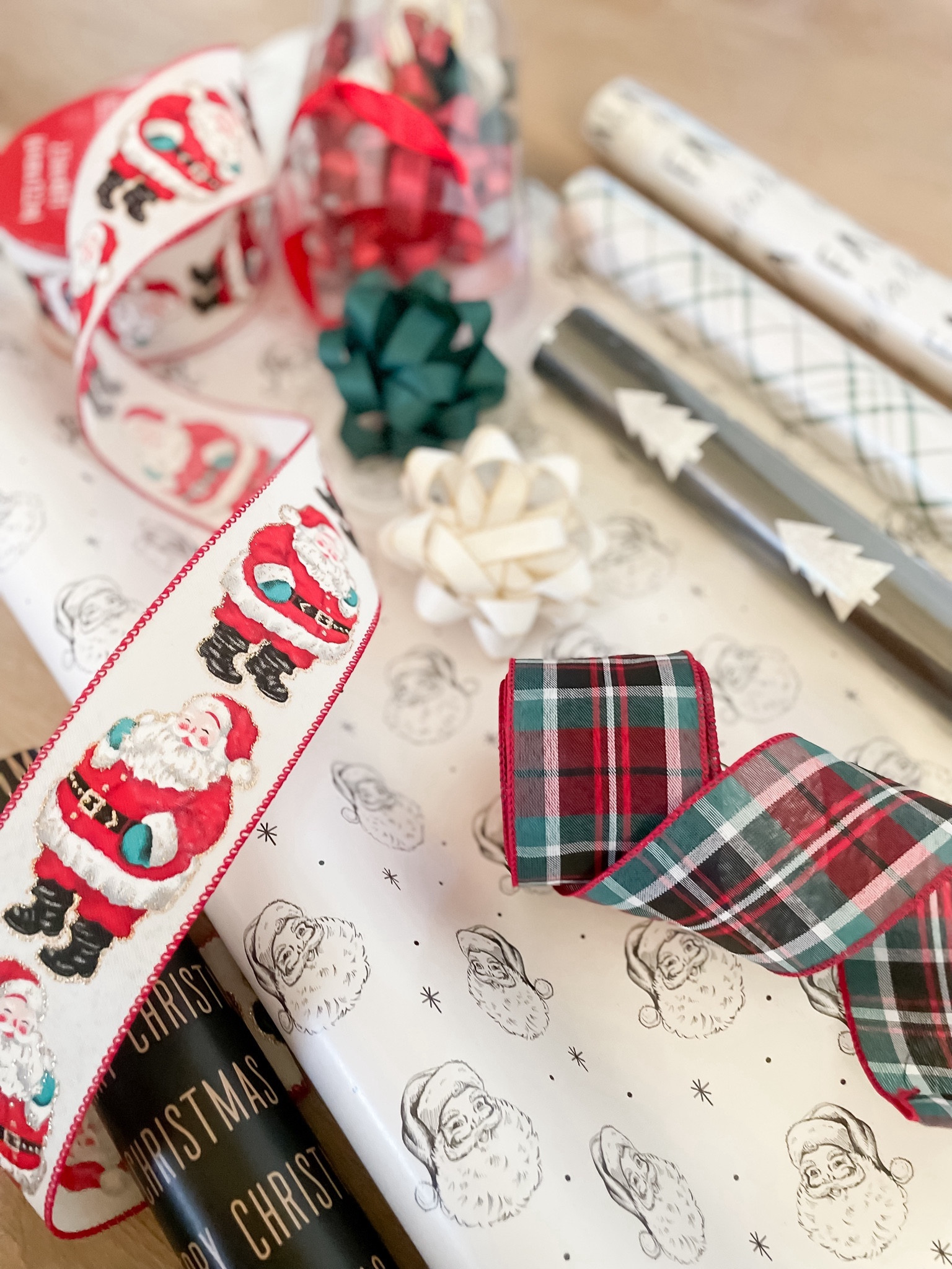 I saw a video pop across my feed where the parents wrapped the doorway like a big present on Christmas Eve and the kids get to bust through the paper on Christmas morning! Thought it was the cutest idea (and a great way to keep them from peeking)! I ran to Walmart to grab some supplies and found THE cutest gift wrap supplies.

#LTKHoliday #LTKkids #LTKSeasonal