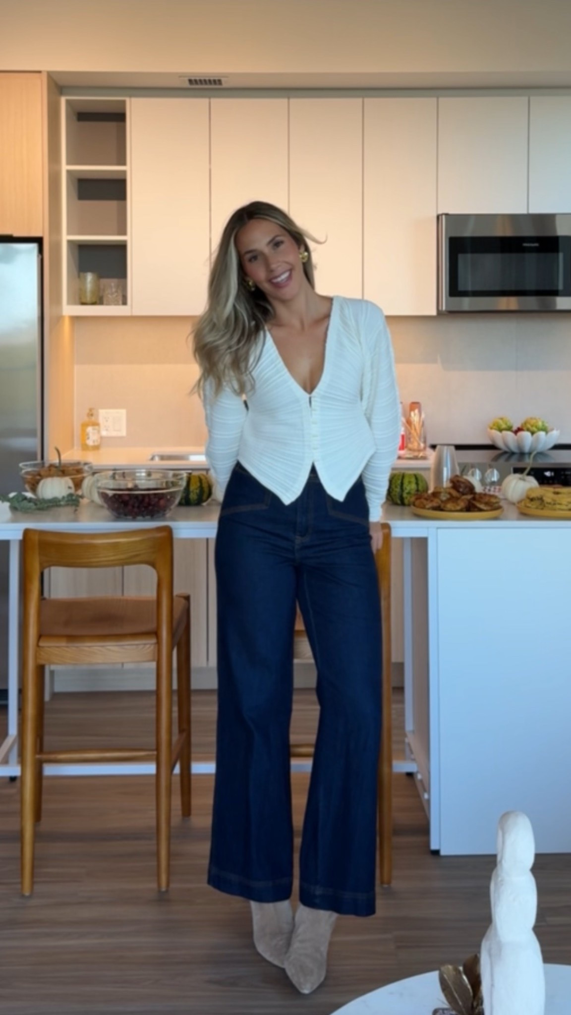 Simple white sweater / white cardigan & dark denim jeans! Plus my favorite brown suede boots for fall 

#LTKStyleTip #LTKSeasonal #LTKFindsUnder100