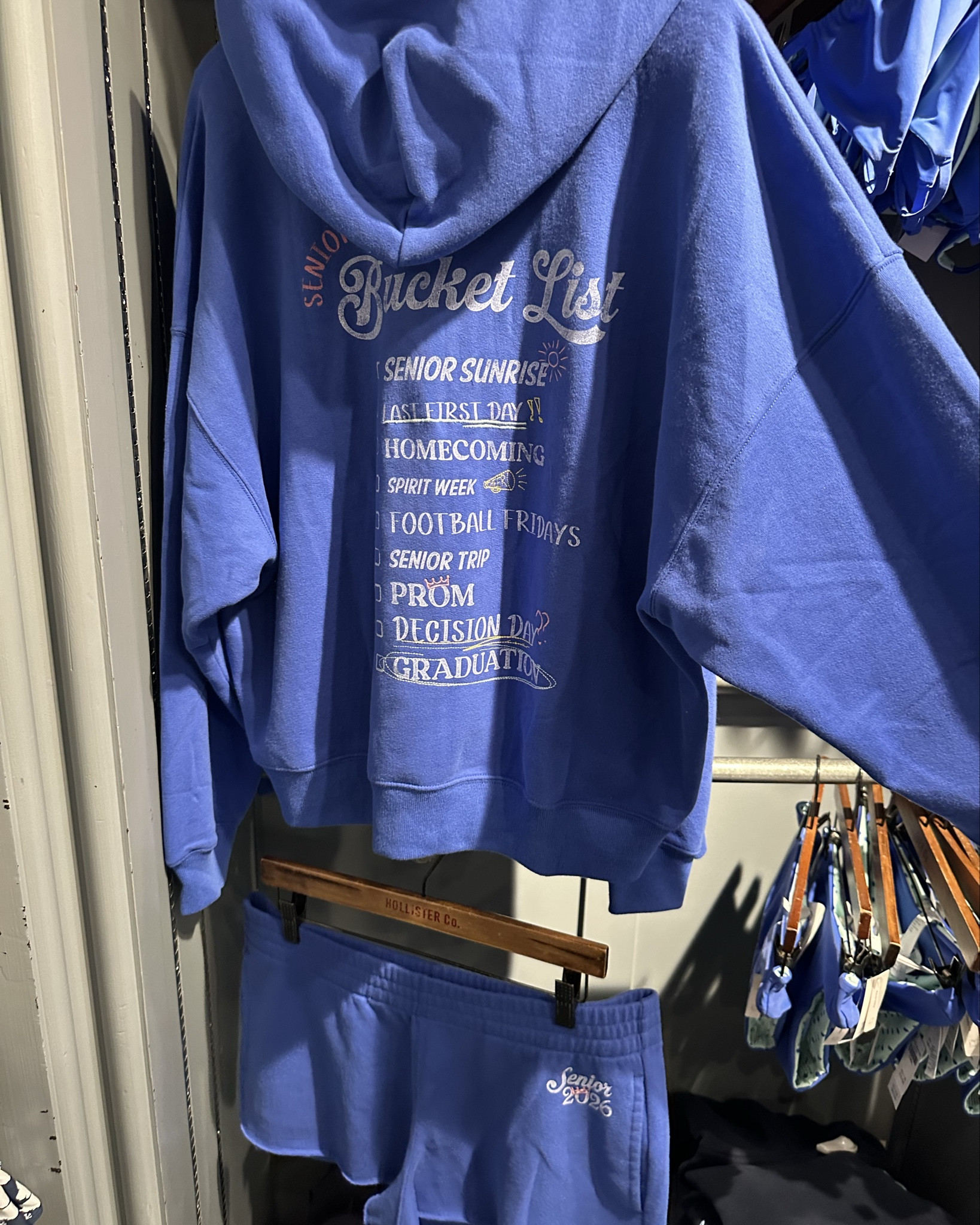 The cutest royal blue matching bucket list sweatshirt & shorts from class of 2026 graduating seniors! So adorable! Both pieces range from sizes XXS-XXL! So soft & comfortable! Hoodie is on sale for $47 & the shorts are on sale for $20! Run to grab these!

#LTKMidsize #LTKSaleAlert #LTKSpringSale