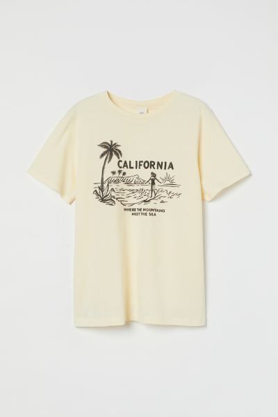 Relaxed-fit T-shirt in soft cotton jersey with a printed design. Ribbed neckline and dropped shou... | H&M (US + CA)