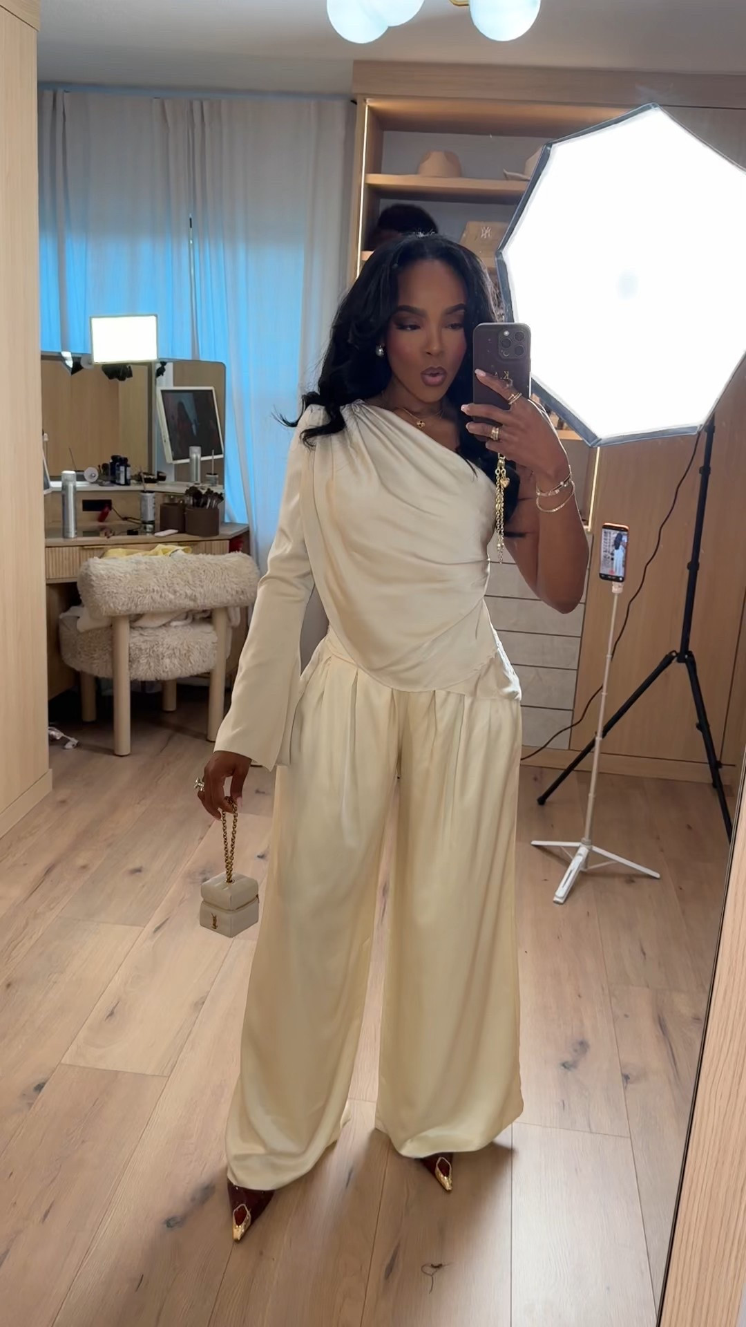 Cost per wear drops fast with a monochrome set like this — soft draping, elevated texture, and an effortlessly polished silhouette that works far beyond one occasion. Styled together it feels luxe and intentional, but each piece also mixes easily with everyday staples for endless rewear.

Perfect for holiday events, dinner dates, winter celebrations, and elevated nights out.

📏 Sizing: Top (Small) • Pants (Small) • Heels (TTS)  
📏 Measurements: 5’4” · 138 lbs · 34D · 27” waist · 40” hips

Styled multiple ways, neutral monochrome outfit, cream evening look, elegant winter outfit ideas, elevated occasion wear, timeless neutral set, chic minimal styling.

Save this post to revisit later.

Follow me on Instagram and YouTube @kirasfashionfinds