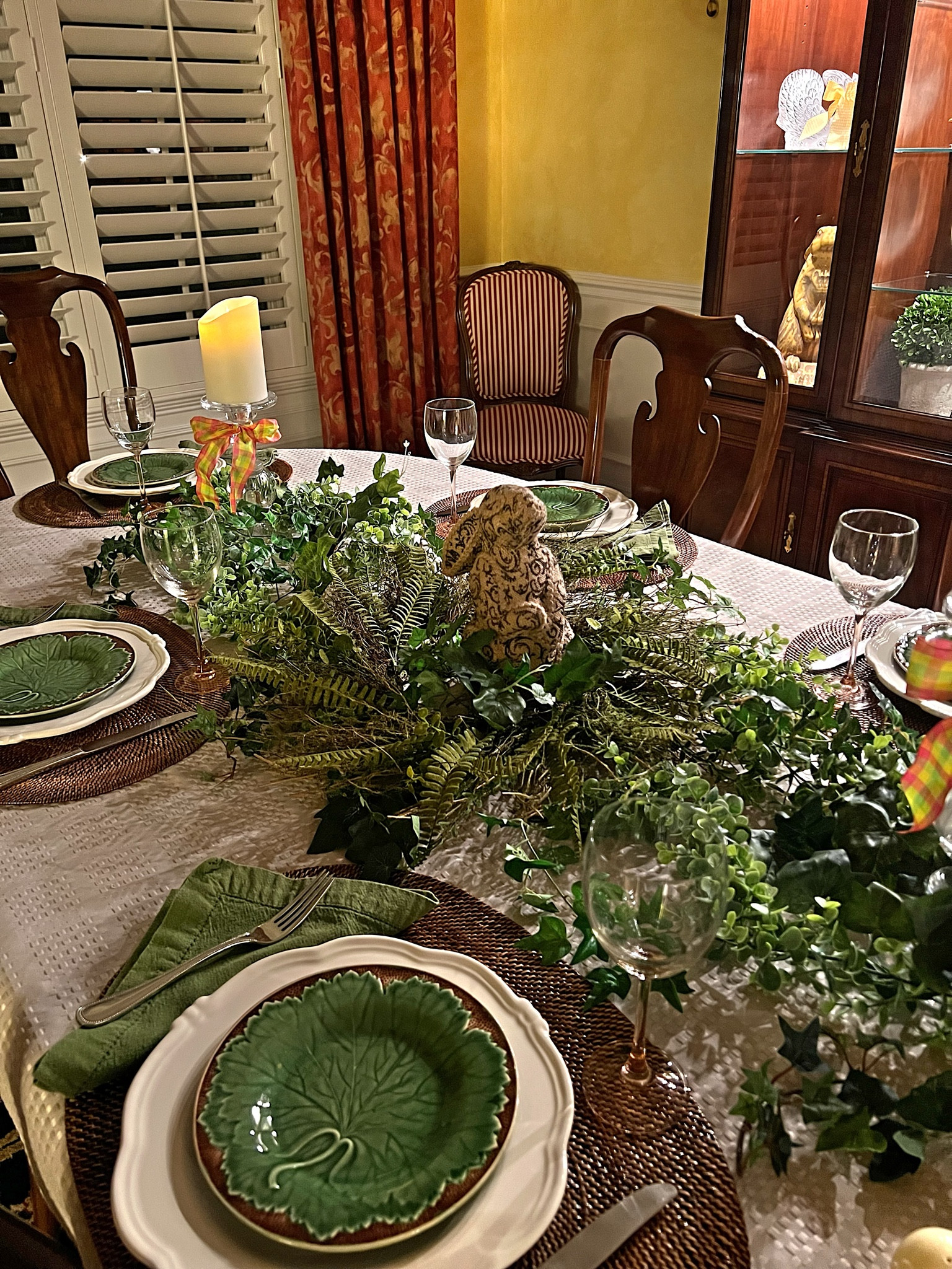 Gorgeous Spring Table Setting for Mother’s Day or for any Spring Party!
Beautiful artificial garlands are styled around a fern leaf-covered wreath. Lots of silk ivy, rattan placemats, olive cotton napkins and dessert plates.  There’s a rustic bunny in the middle of the centerpiece!

#LTKSeasonal #LTKhome #LTKunder50