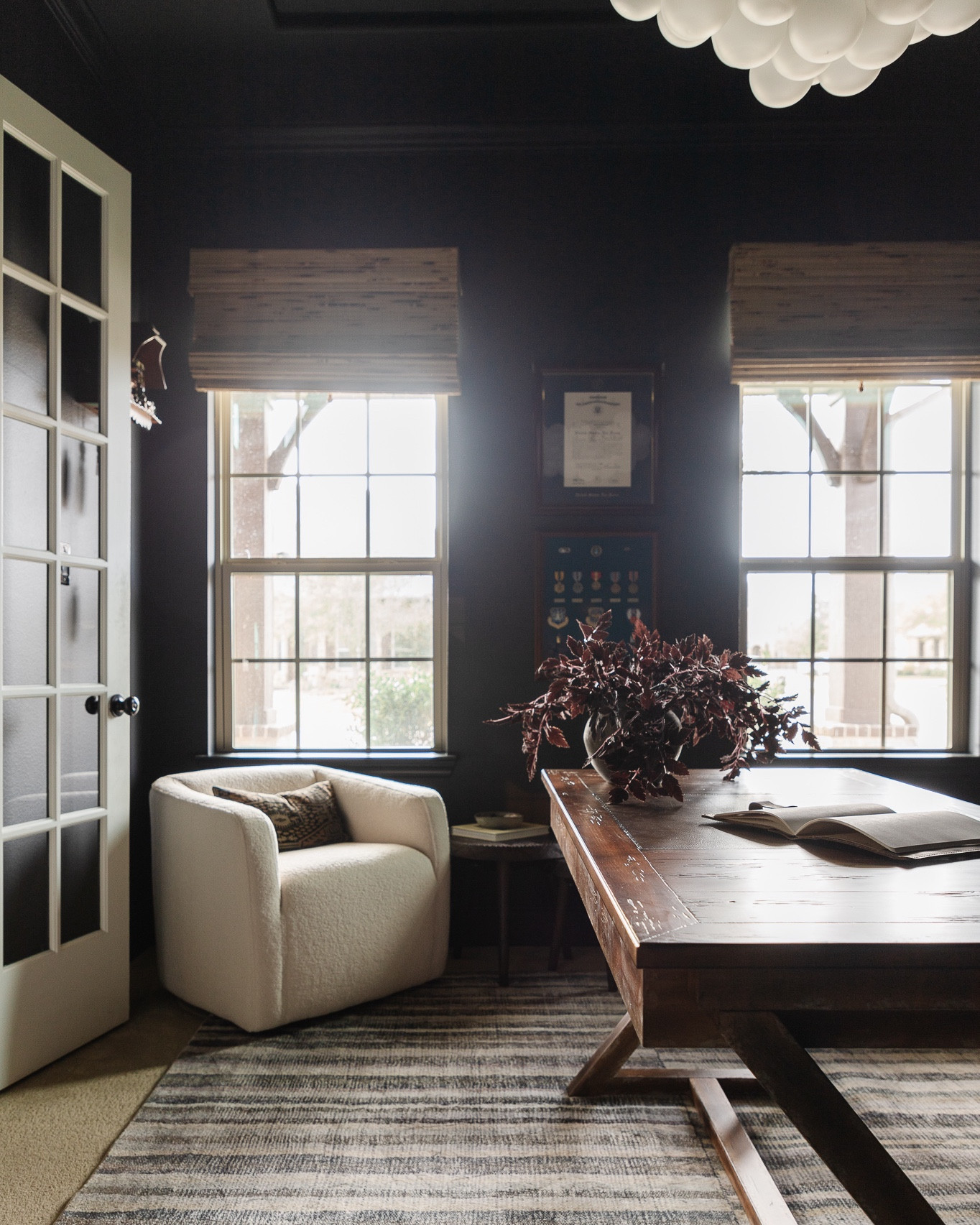 More sources from our moody home office reveal including the most asked about stripe rug and bubble light fixture

#LTKhome #LTKFind