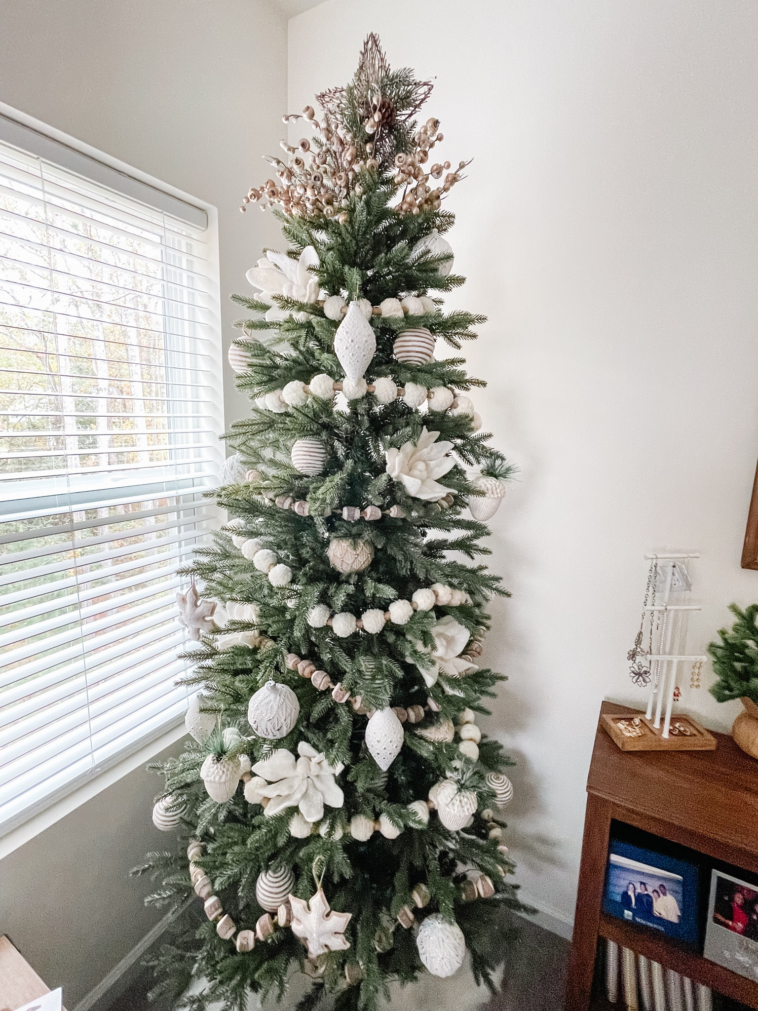 My bedroom Christmas tree is so beautiful and I love how it looks even when it’s not lit  this is the Jackson Noble tree and I am using these rustic wood beaded garland, and these beautiful felt snowflakes for the Decour. Everything else is from hobby lobby unfortunately so I cannot link it but I hope that you enjoy seeing how I styled my Christmas tree in my bedroom.

#LTKSeasonal #LTKhome #LTKHoliday