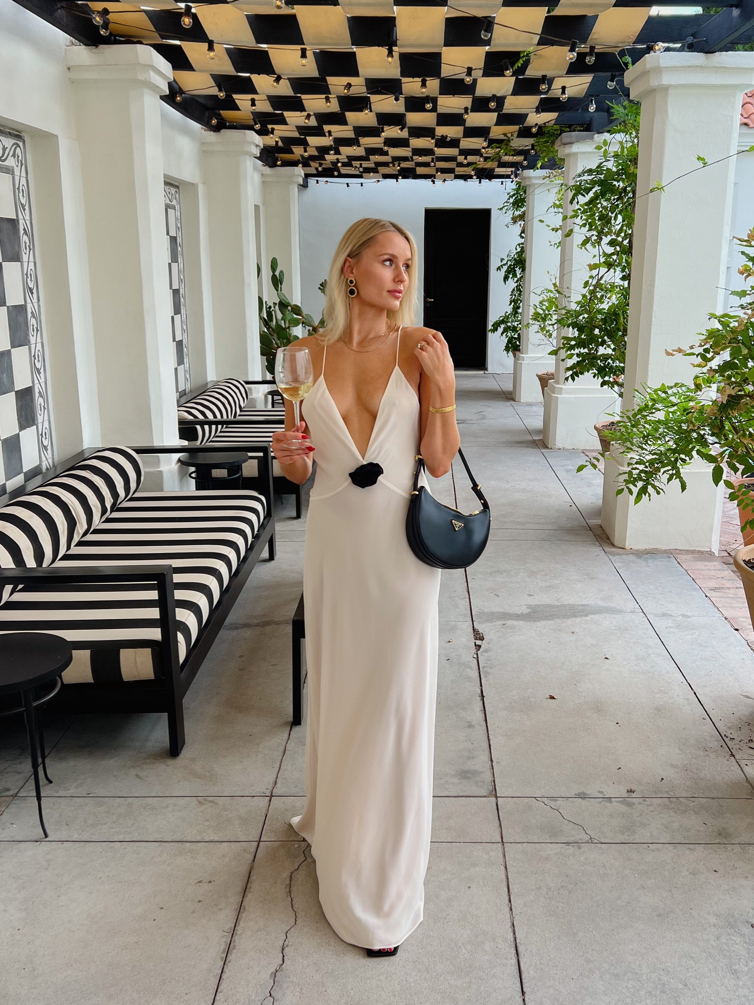 Dinner in Argentina 🤍🖤 I love how the black flower is also removable! I’m wearing a size small.

#LTKtravel #LTKSeasonal