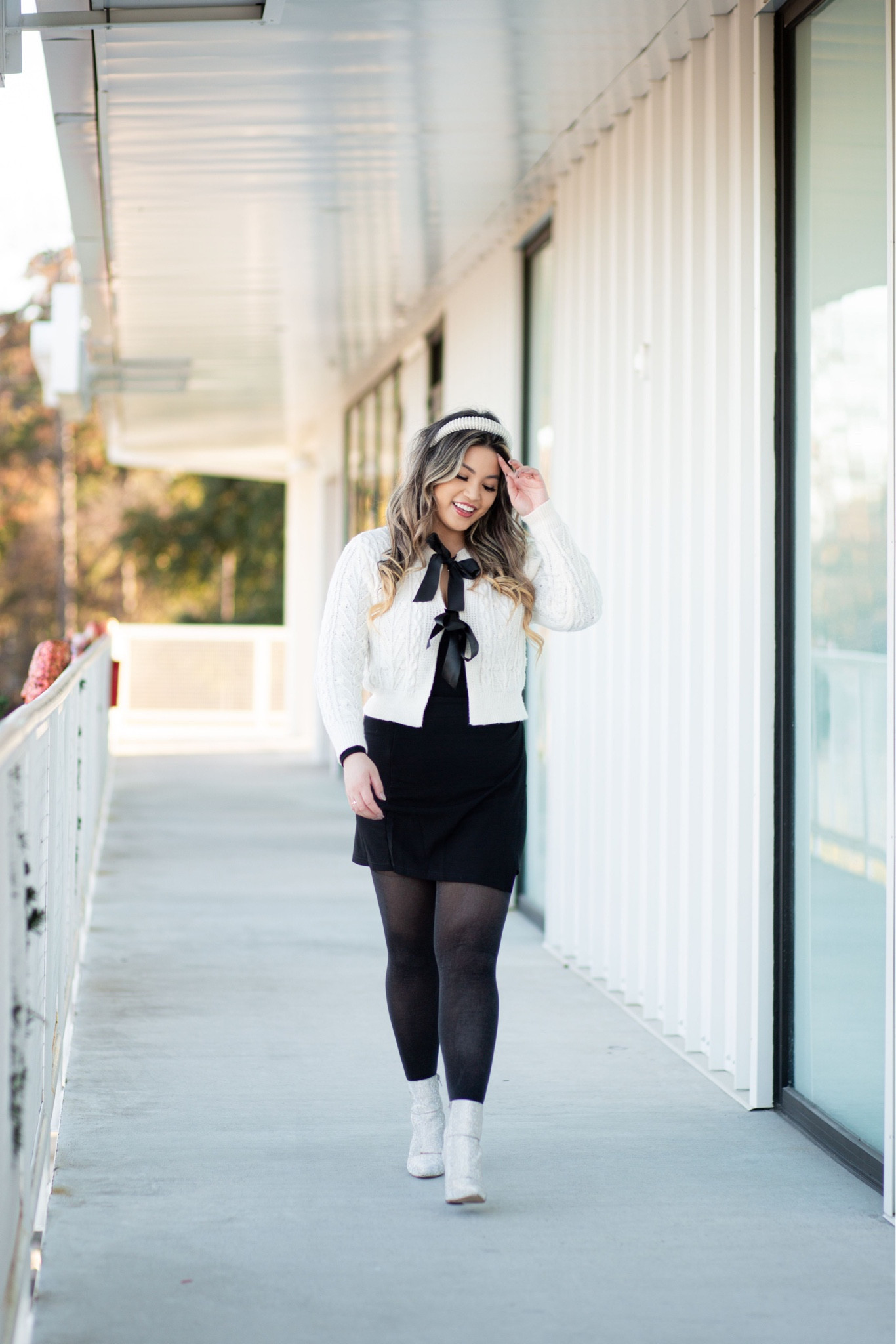 Bow sweater, rhinestone boots 
I linked a few options under $40 for boots!! The sweater is also on sale. 

#LTKmidsize #LTKsalealert #LTKstyletip