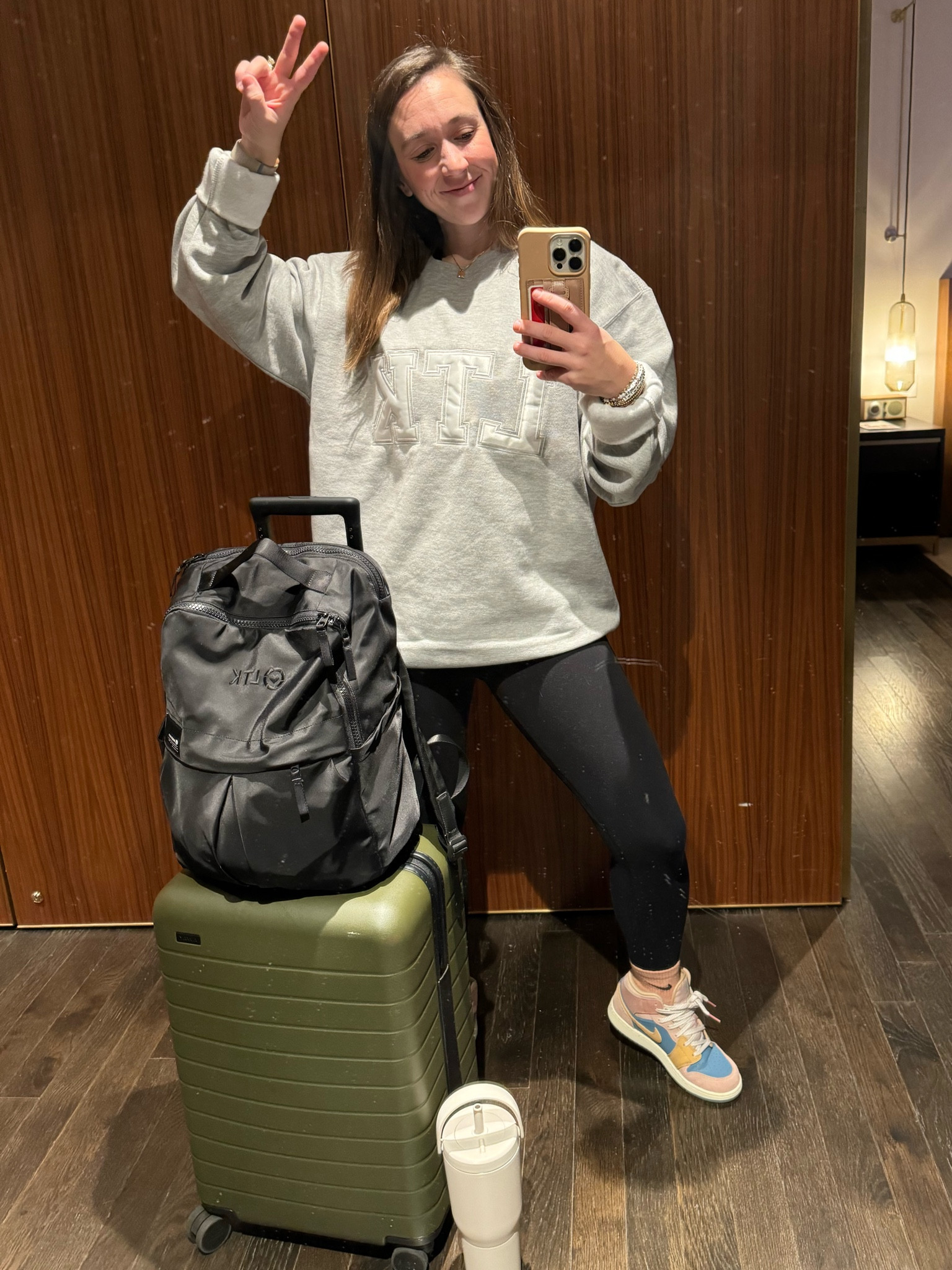 My travel go to - cuffed sweatshirt, leggings and some cool sneaks! This luggage combo is my fave too! Never going back after getting my away bag!