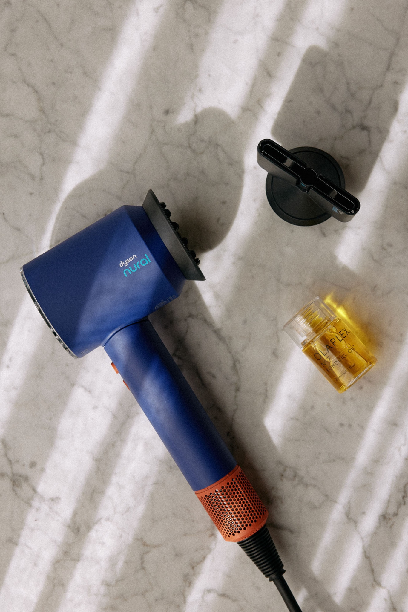 My favorite hair products to care for scalp & the lengths… 

1. Living Proof Density Serum, I’ve been using it for about 2 months now and have noticed considerably less shedding. 
2. Love that Dyson Supersonic Nural™ hair dryer is designed specifically with scalp health in mind. I constantly use the Scalp protect mode which automatically reduces heat and airflow as the tool gets closer to my scalp, helping to protect my hair and scalp from heat damage. 
3. OLAPLEX Nº.7 Bonding Oil is a long time favorite! Love the added shine, the softness, and color vibrancy
4. The Nº.6 Bond Smoother is a fairly new discovery but I can’t live without it. It gets rid of frizz for me like nothing! 

#LTKBeauty