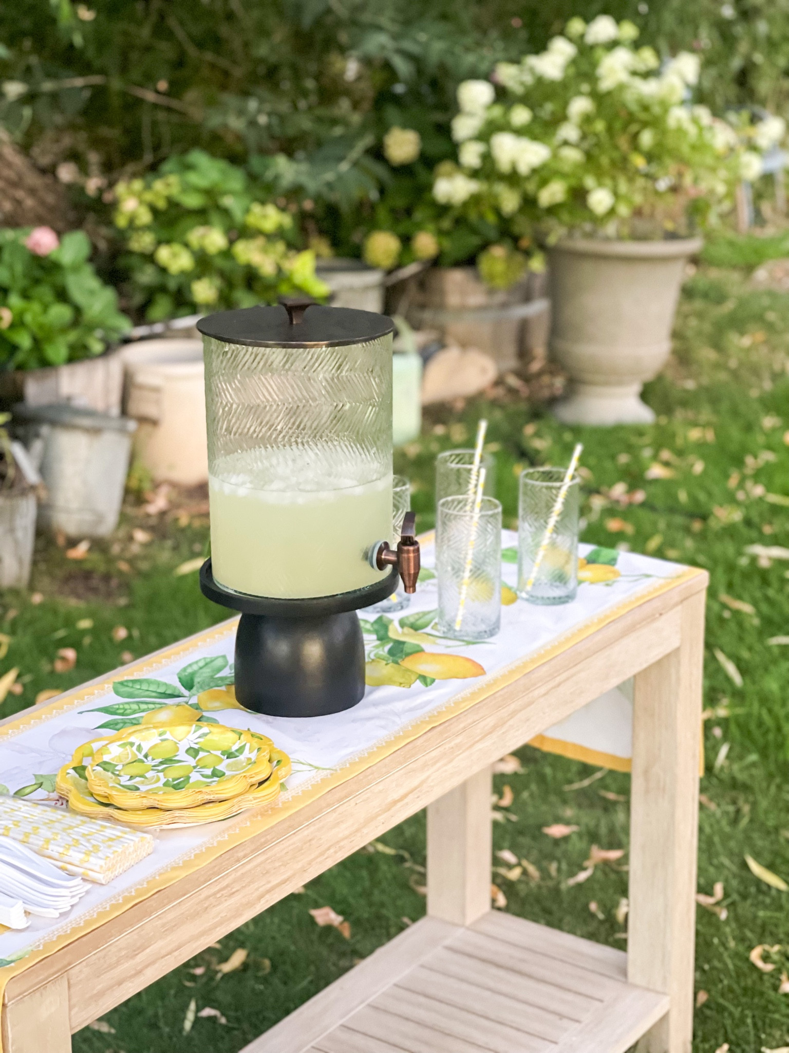 Outdoor console table. Pottery Barn outdoor console table sale. Outdoor entertaining. Summer entertaining. Ayesha Curry Sweet July for Pottery Barn. Best herringbone beverage dispenser. Lemon paper plates. Lemon theme party. Amalfi coast inspired party. Yellow and white decor. Entertaining essentials. Herringbone glasses. Summer party essentials. Modern beverage dispenser. Beautiful large urn planter for hydrangea. Pottery Barn home. Pottery Barn finds. Amazon home. Amazon finds. Pottery Barn sale. Sweet July Pottery Barn sale. 💛🤍🍋 

#LTKsalealert #LTKhome #LTKFind