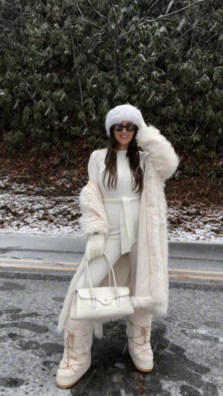 Winter outfit, snow outfit, winter coat, faux fur coat, mob wife, Slavic girl, moon boots, moon boot dupes, winter whites

#LTKSeasonal #LTKVideo #LTKshoecrush