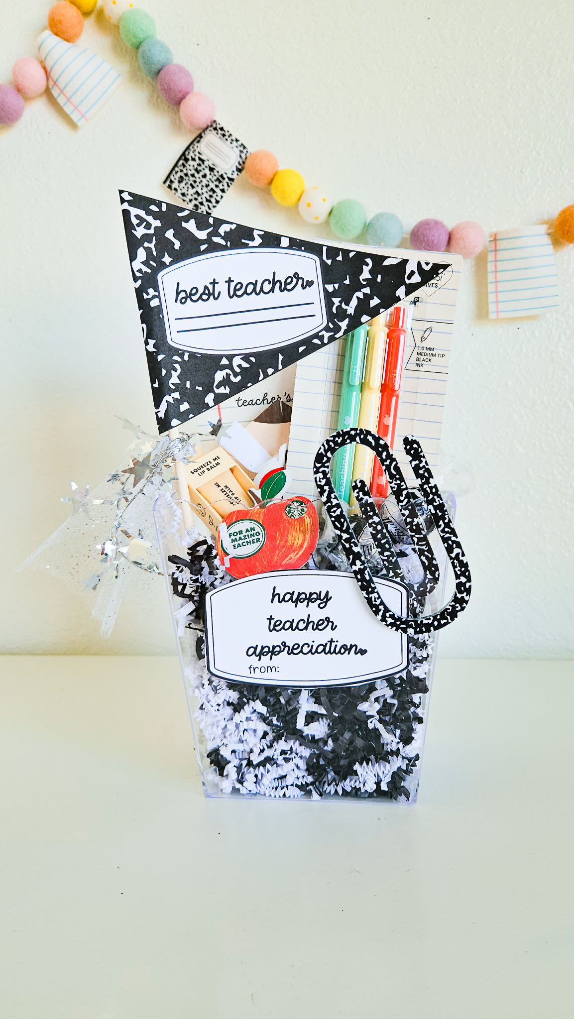 Is this not the cutest composition book themed  gift?! I love the scalloped buckets at Dollar Tree for creating themed gift baskets on a budget! Perfect for Teacher's Appreciation! 

 #LTKmomlife #LTKSeasonal #LTKKids