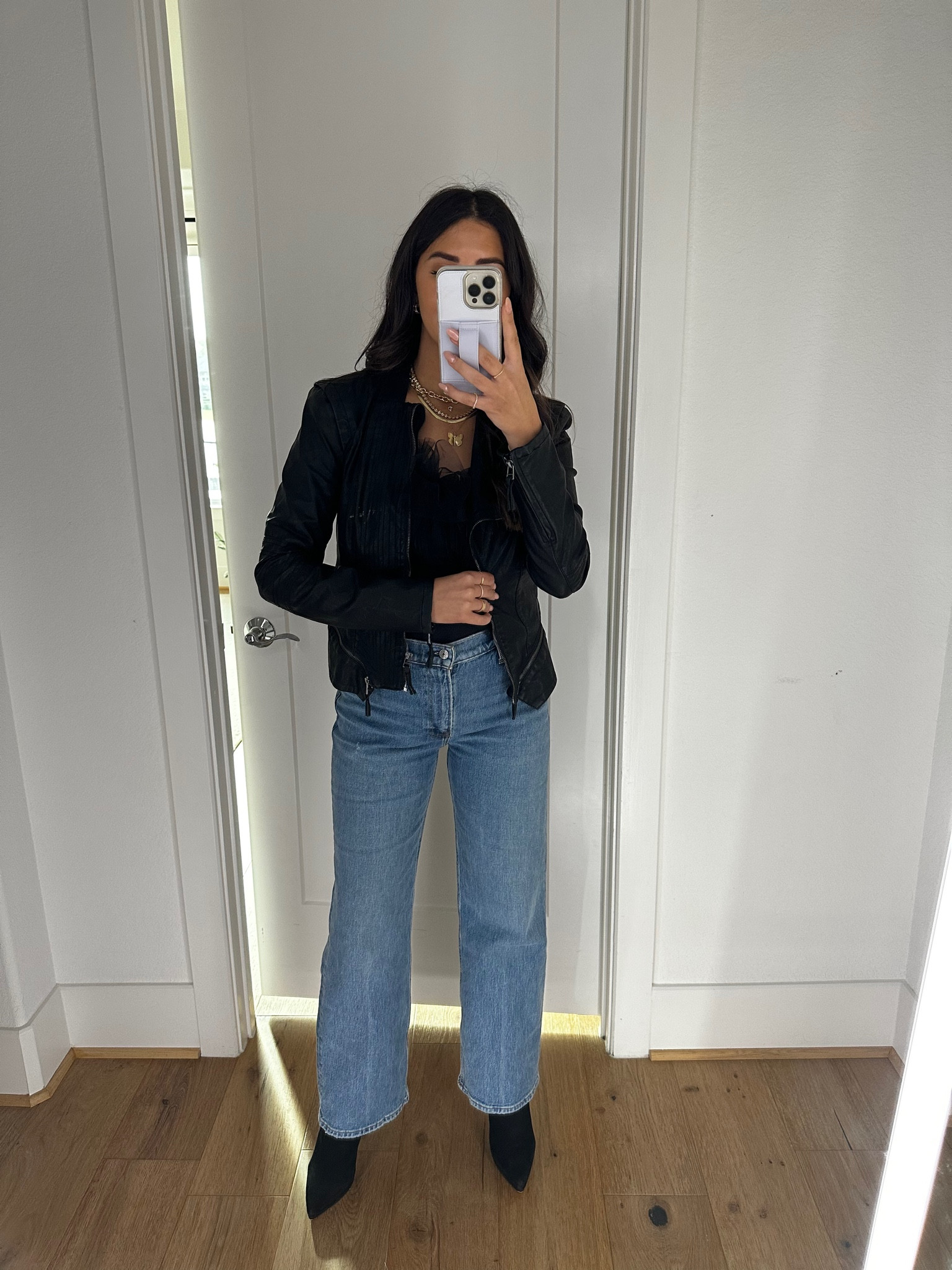 Layered this fun top with a leather jacket for a more relaxed look! 

Jacket is currently on sale!
SALE: $59.90
ORG: $98
Sizes:

Leather jacket- small
Top- small
Jeans- 27
Booties- 8

#LTKsalealert #LTKSeasonal #LTKHoliday