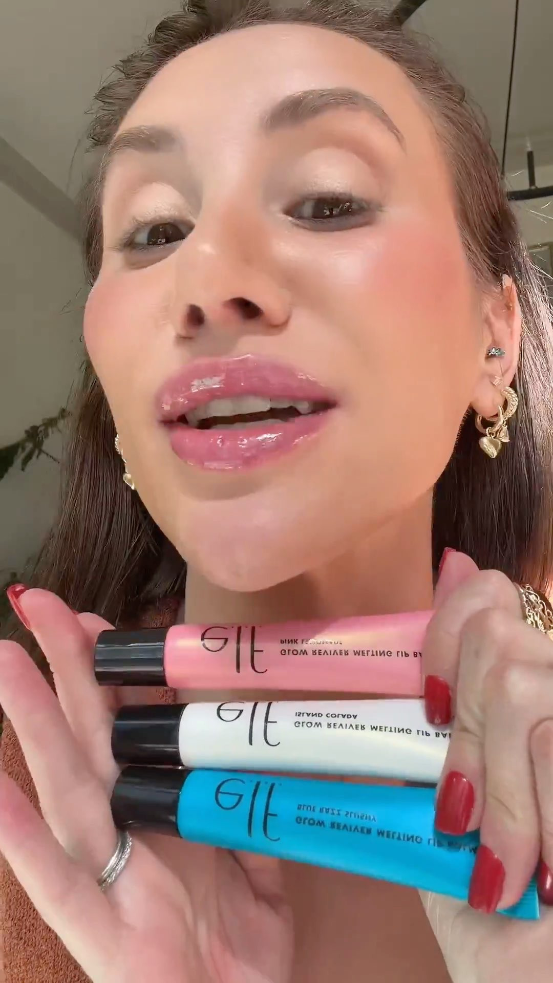 the shimmer shades of the e.l.f. glow reviver melting lip balm are everything this summer — cotton candy crush, blue razz slushy and island colada. shea butter, mango butter, cocoa butter and hyaluronic acid so your lips are so soft and hydrated and the shimmer just catches the light beautifully. $9 and i will be buying every shade.

#elf #lipbalm #shimmerlip #tintedlipbalm #summerlip
elf glow reviver melting lip balm, shimmer tinted lip balm, hydrating lip balm with shimmer, butter lip balm, elf lip balm shimmer, affordable tinted lip balm, hyaluronic acid lip balm, glossy shimmer lip, summer lip balm, elf cosmetics lip 

 #LTKBeauty