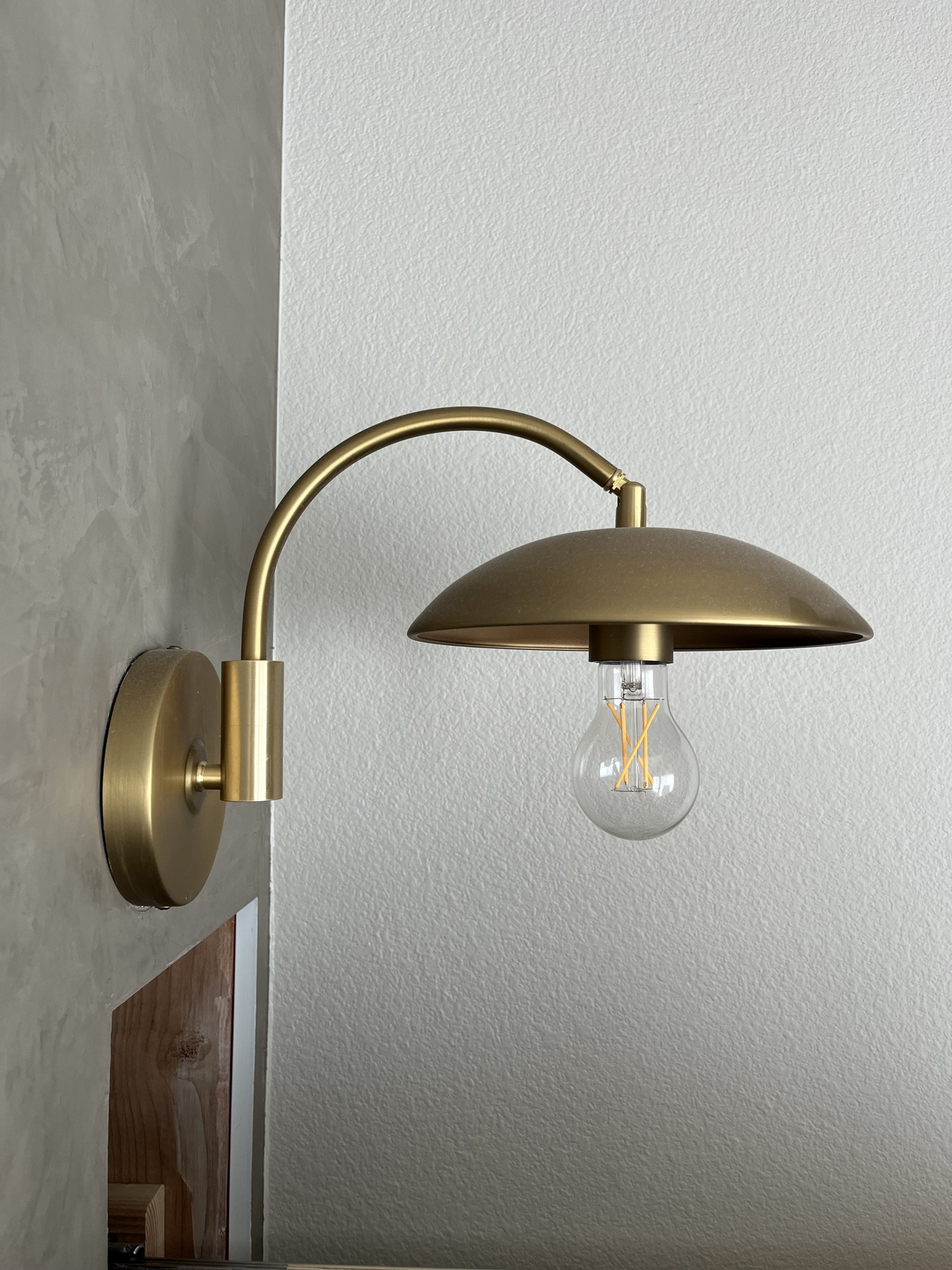 The cutest sconce above our reading nook!

#LTKfindsunder100 #LTKhome