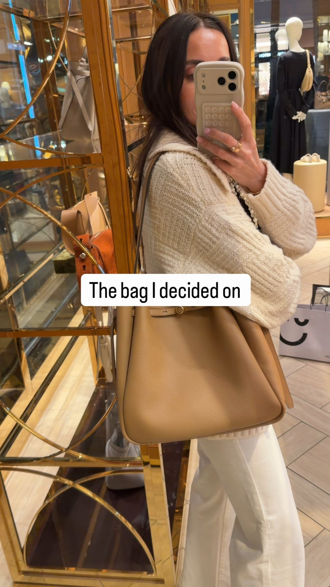 I went with the larger size bag. I love the shoulder strap, also showing the small size bag which I had In different color 

#LTKgrwm #LTKootd #LTKdayinmylife