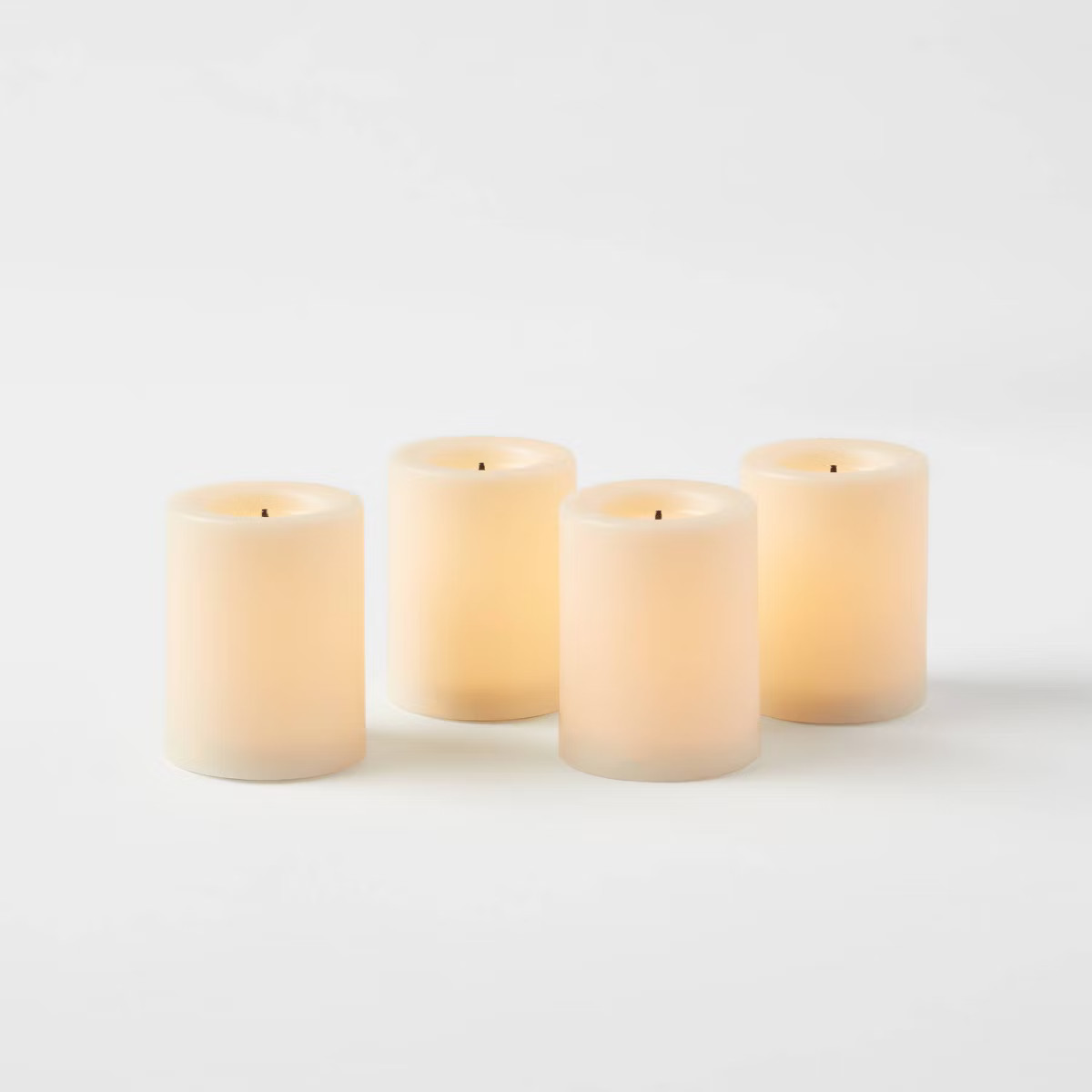 1.82" x 1.4" 4pk LED Votive Flameless Black Wick Candle Cream - Threshold™: Tea Lights, Safe De... | Target