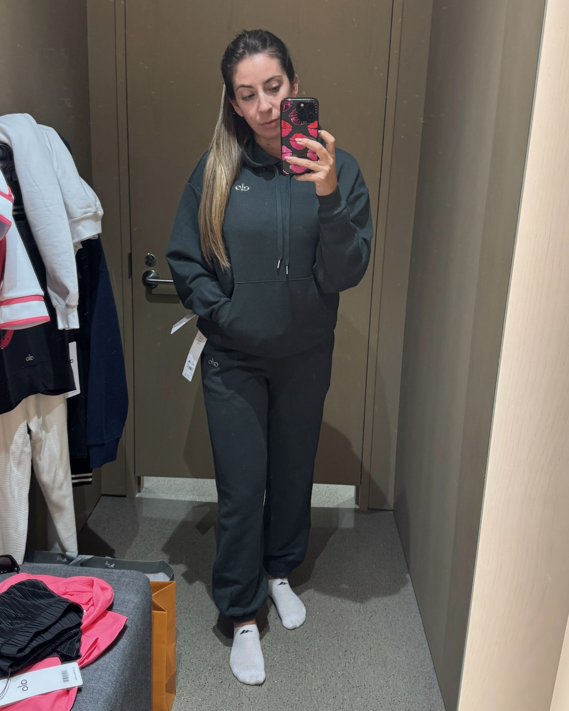 Try on at Alo! I GET THE HYPE! These pieces are so soft!! 

Def runs on the larger size, so expect your true size to be a baggier fit. If you want something more form fitting then I would size down one.  

 

#LTKActive #LTKStyleTip #LTKFitness