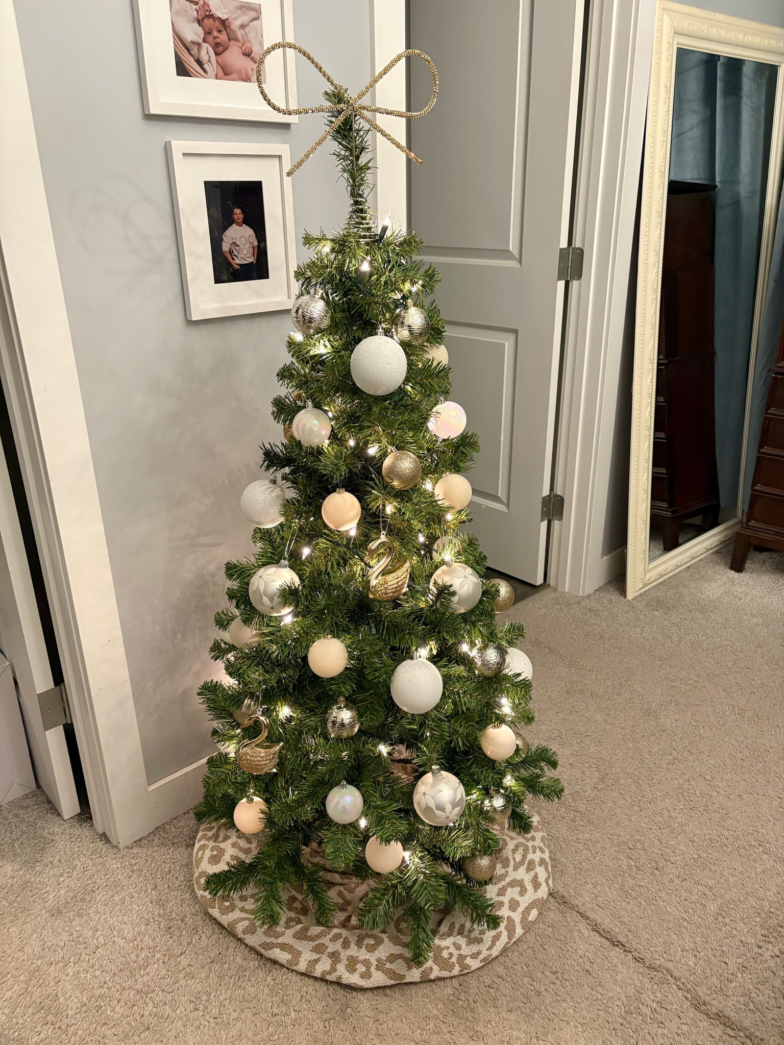My sweet bedroom tree. 

I used a throw blanket as a tree skirt. 

4’ Christmas tree
Bow tree topper
White and gold ornaments

#LTKcanada #LTKholiday