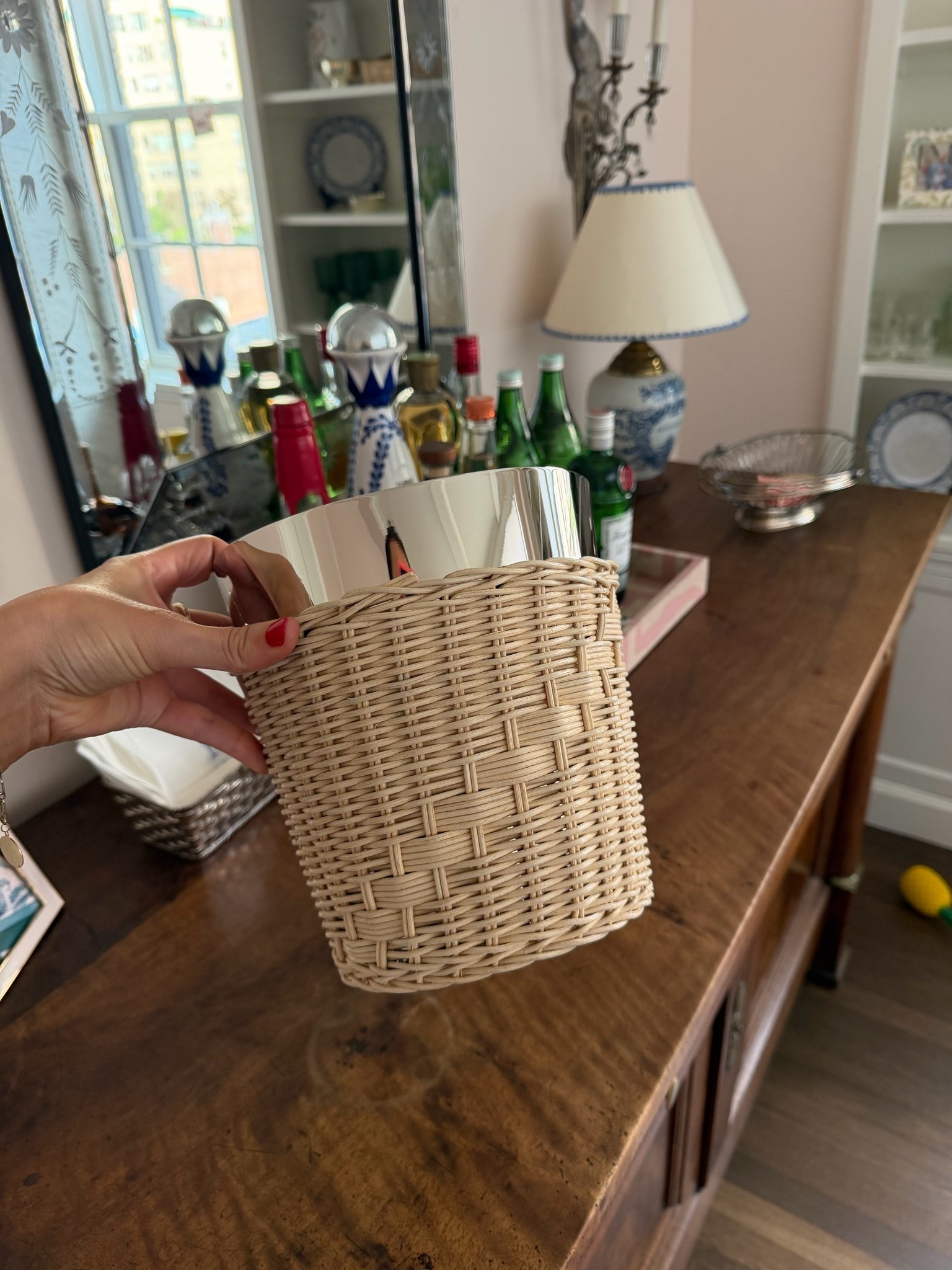 A chic new ice bucket wrapped in wicker, a perfect item for my home bar.

#LTKHome