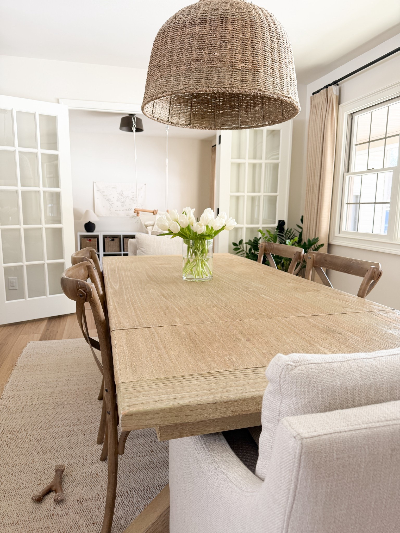 Neutral dining room 

Amazon dining chairs & rug 
Affordable light fixtures 

#LTKHome #LTKspring #LTKSaleAlert