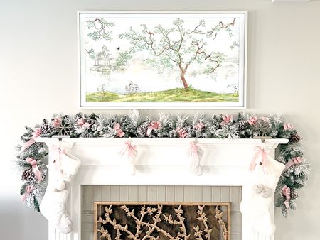 And the stockings were hung by the chimney with care. I styled my fireplace mantle with a flocked garland, velvet ribbon, snowflake stocking holders & fuzzy Christmas stockings. Pink Christmas, feminine, grandmillennial, flocked, fireplace

#LTKhome #LTKHoliday #LTKunder50