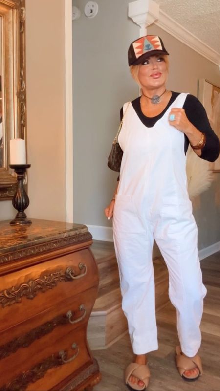 Today I’m wearing one of my favorite jumpsuits & I own it in white & denim.  It’s not see through & the shoulders just slide down making it’s easy to take on & off. I’m wearing my true size med & if you do not have the Roam slides what are you waiting on??  These are chefs kiss & so comfy & stylish  #casual #casualstyle

#LTKstyletip #LTKshoecrush