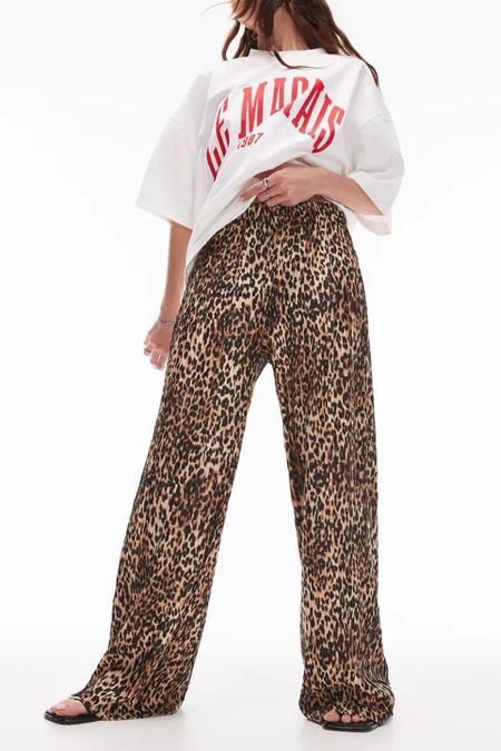 Topshop leopard print pants 
Travel outfit 

#LTKTravel #LTKSeasonal #LTKStyleTip