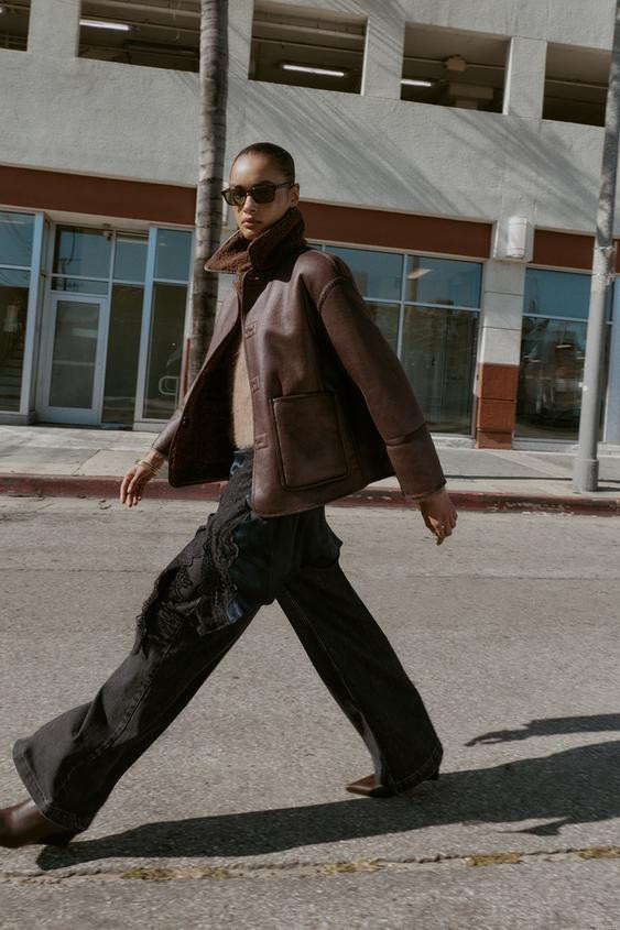 Lapel collar long sleeve jacket. Front pockets. Combined suede effect and fleece fabric detail. F... | Zara US