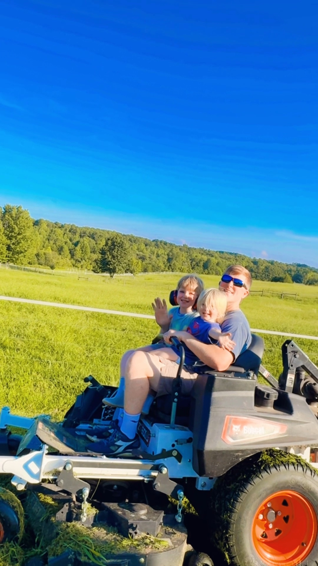 Nothing these little country boys love more than riding on the lawnmower with daddy - oh these are the days !!!  🚜