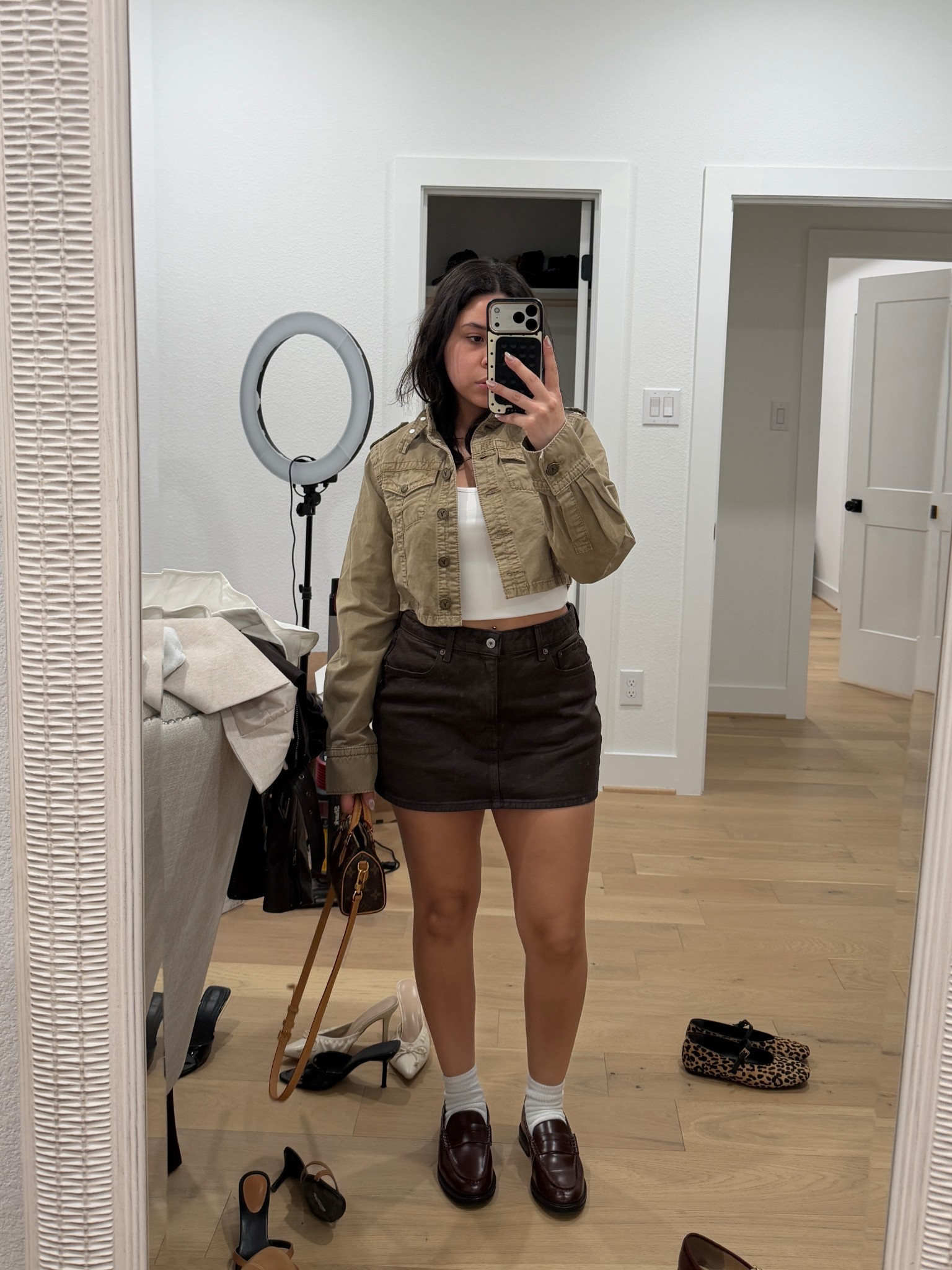 Skirt: 26 
Tank: small
Jacket: small 
Loafers: 7 
White socks 
Nano speedy bag 

#LTKootd #LTKPetite #LTKNYFW