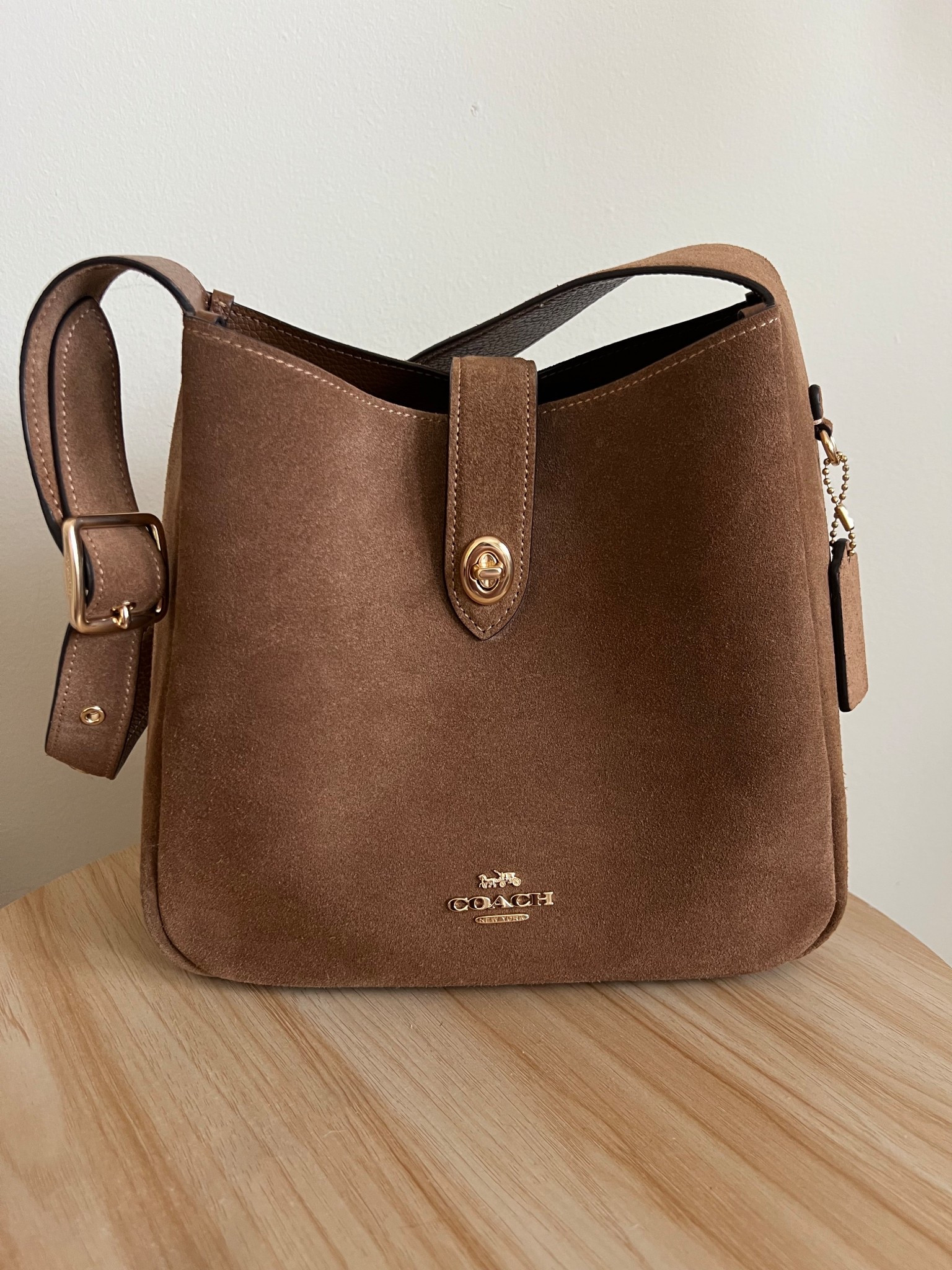 Love this brown suede Coach shoulder bag, currently 38% off! It’s the perfect size and I’ve been using it on repeat - it goes with everything!

#LTKbag #LTKsale #LTKstyletip