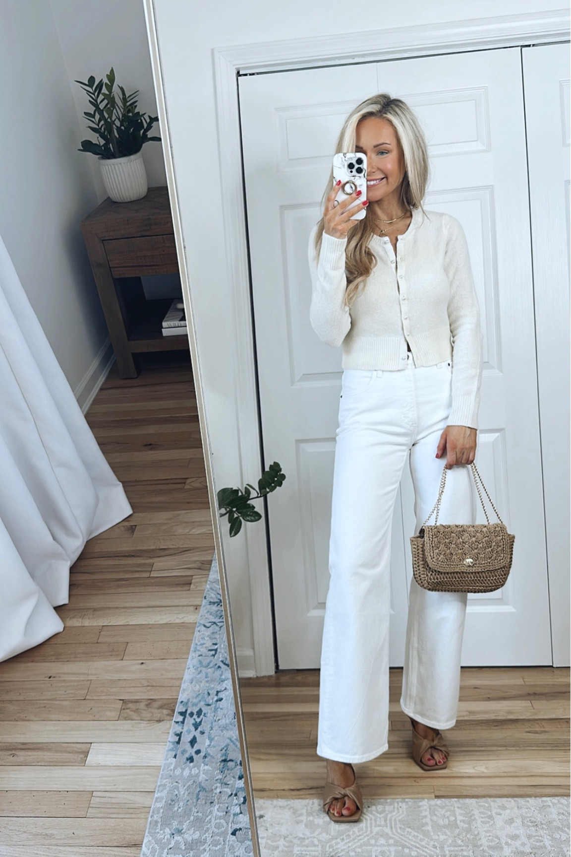 Spring outfit with white jeans! Sizing info:
-White cardigan runs a little small, if in between sizes then recommend sizing up one size (I’m wearing a size small)
-White jeans run TTS, wearing a size 26
-Mules run TTS

#LTKstyletip