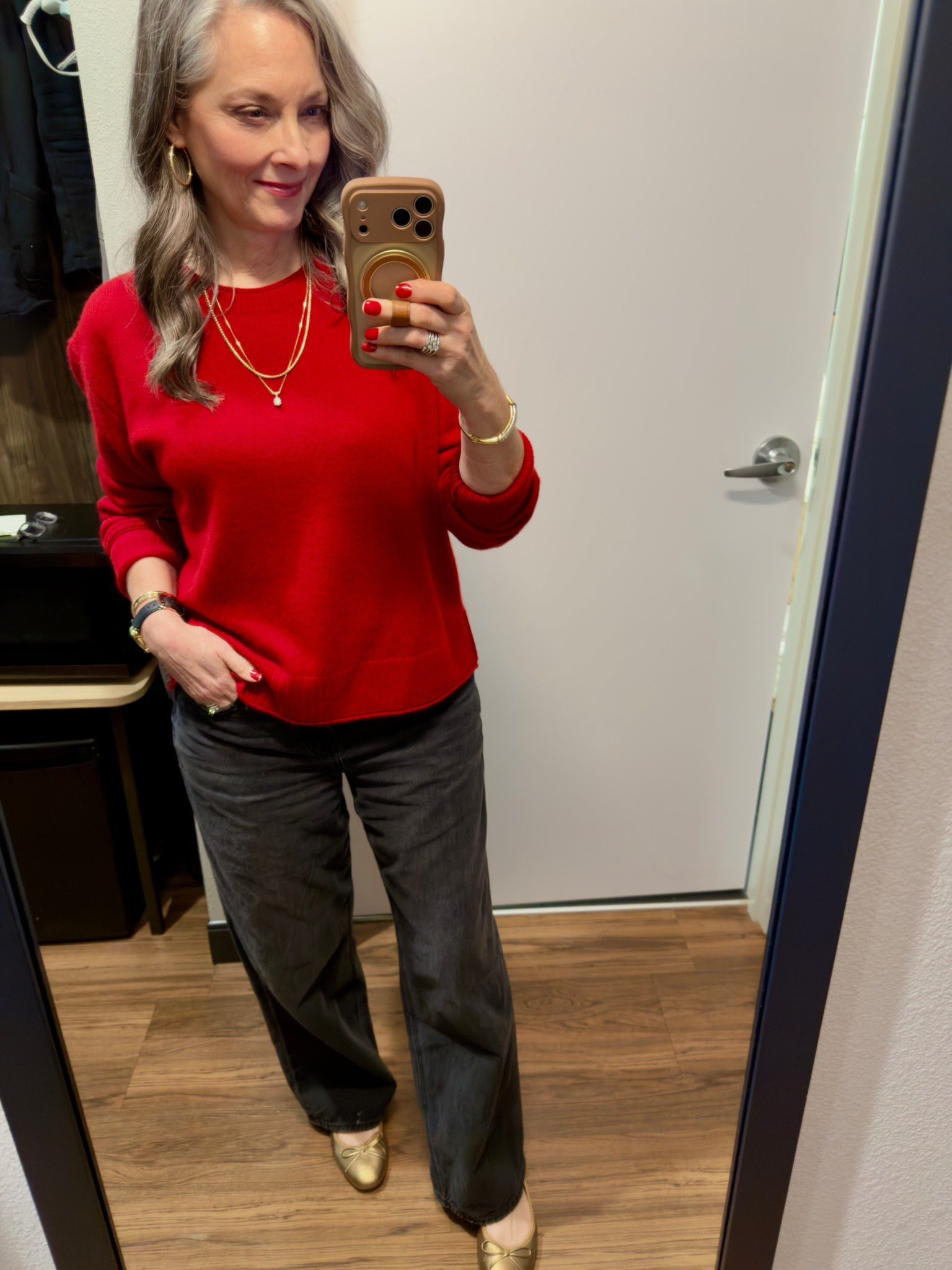 Favorite American Eagle Stovepipe jeans. Wore to a casual out of town Christmas party with this red cashmere sweater from Quince. I ordered a medium so that I could layer with it. I could have worn a small. Best shoes ever….Birdies! Newest is the vintage gold ballet flat. 

#LTKootd #LTKOver40 #LTKHoliday