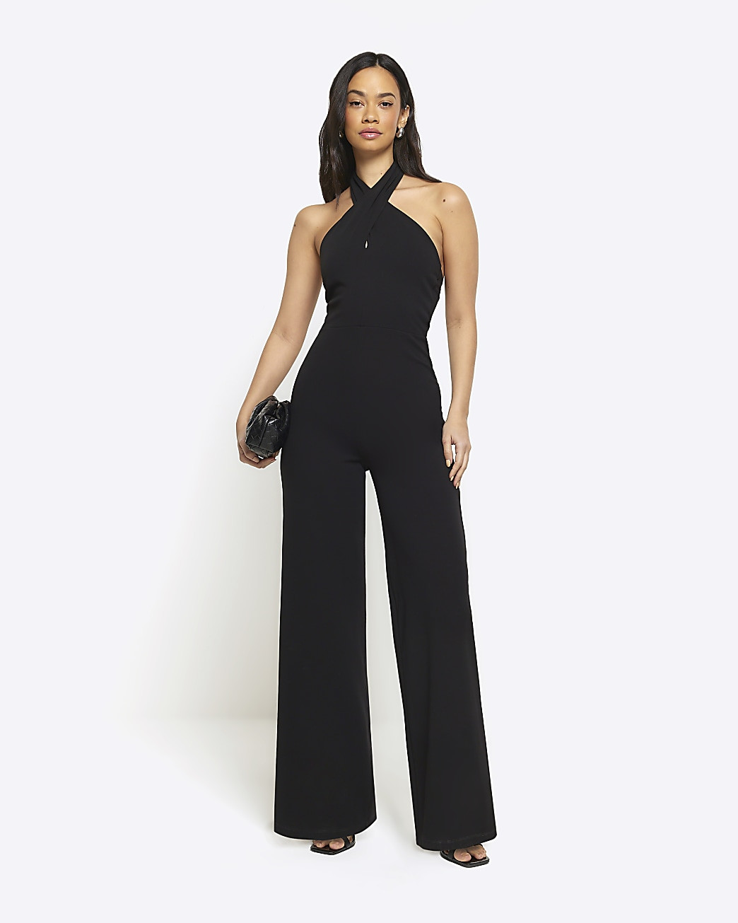 Black crossed halter neck jumpsuit | River Island (UK & IE)