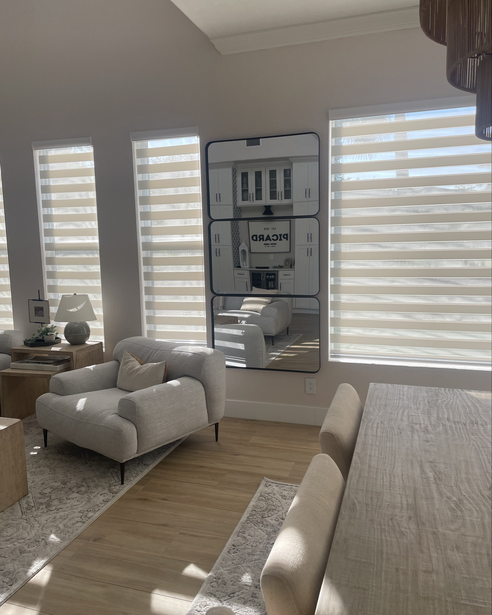 Mirrored wall created to bring more openness to the space! I love this DIY created using 3 accent mirrors 🪞 #mirrors #diy #homedecor #homedecorating #livingroom 

#LTKFindsUnder100 #LTKHome #LTKFamily